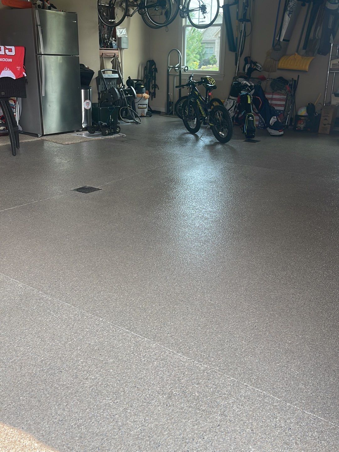 Large Patio + Garage Project in Moon Township by Floors in a Day, Inc