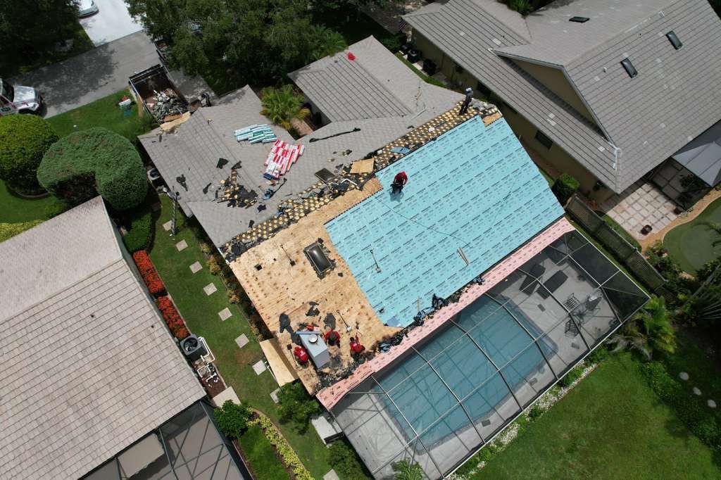 Standing Seam Metal Charcoal Grey Roof Replacement and Skylight Installation in Jupiter by Art's Roofing & Construction