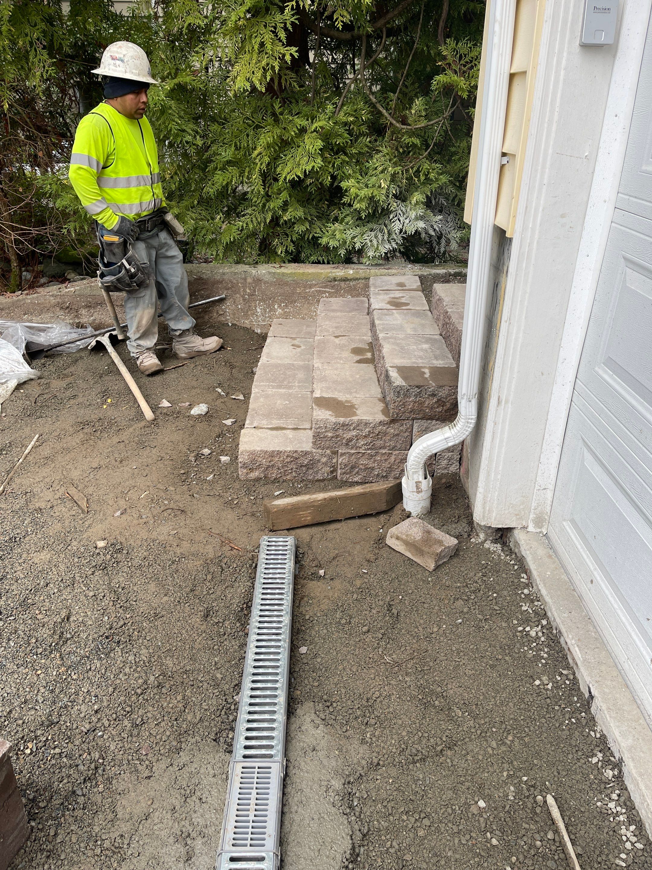 Lorra | Asphalt Driveway Repair & Retaining Wall by Jireh Asphalt & Concrete Inc 