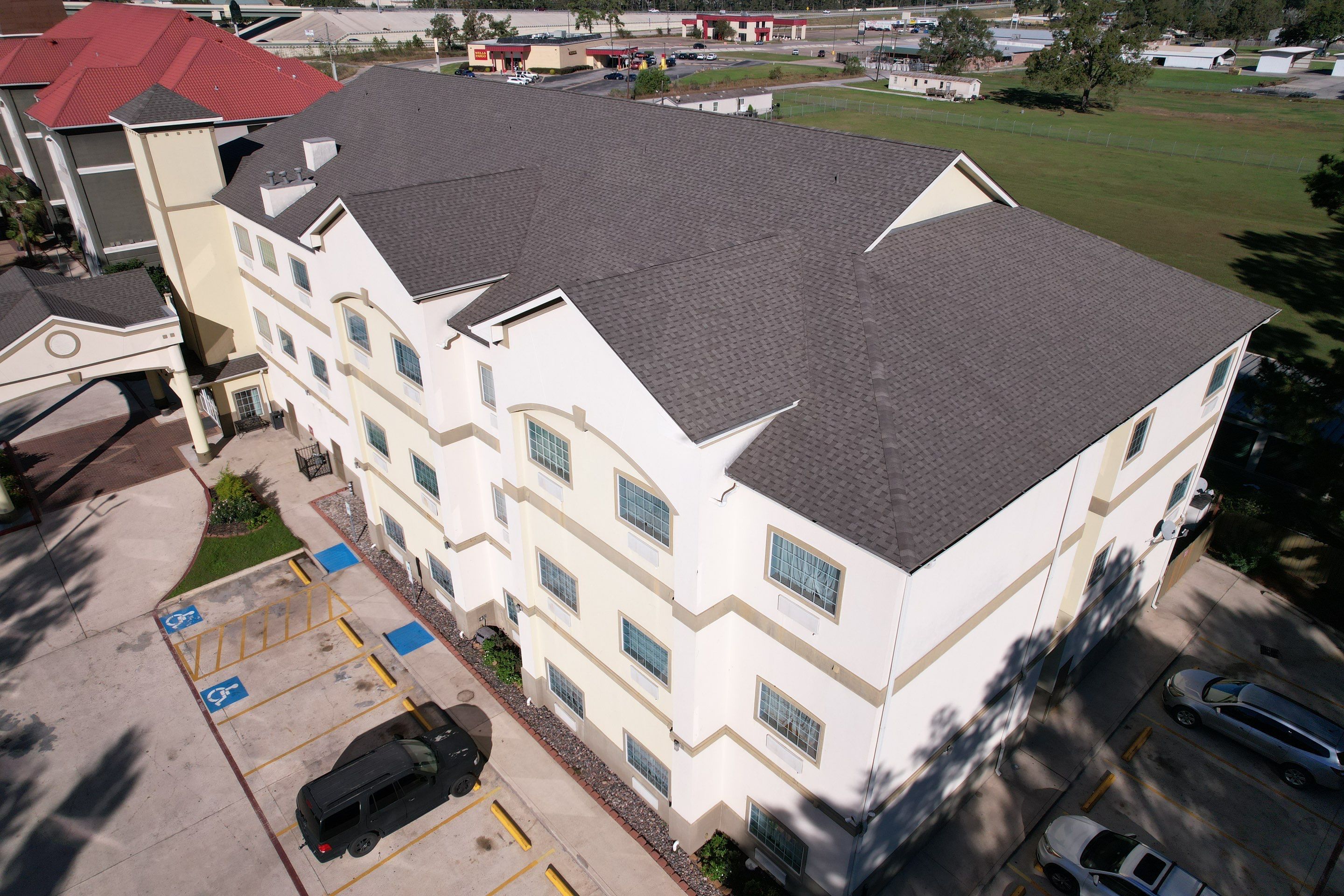 Commercial Roofing - Tamko Titan XT Weathered Wood by STX Roofing