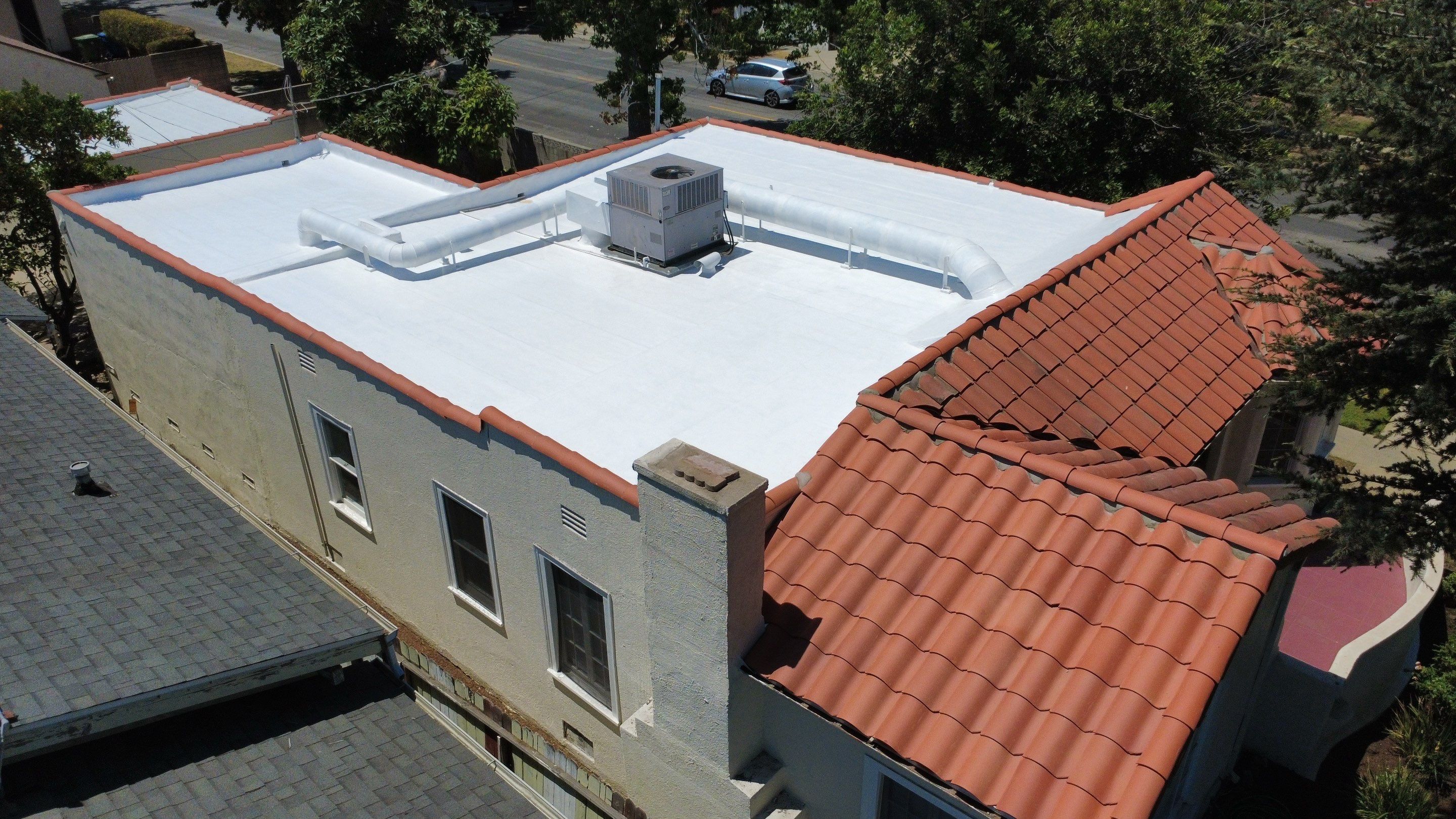Tile Reset and Silicone Membrane Installation by Hull Brothers Roofing