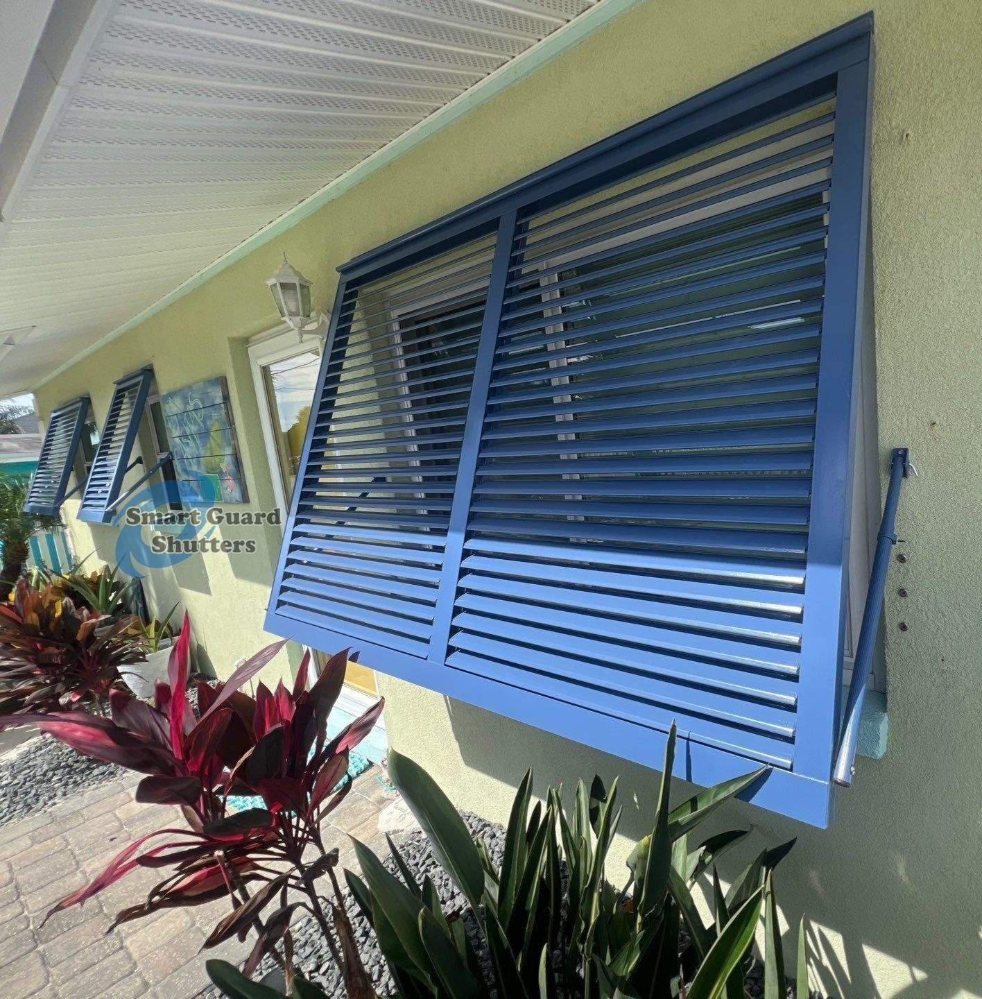 Impact Bahamas in Distant Blue by Smart Guard Shutters