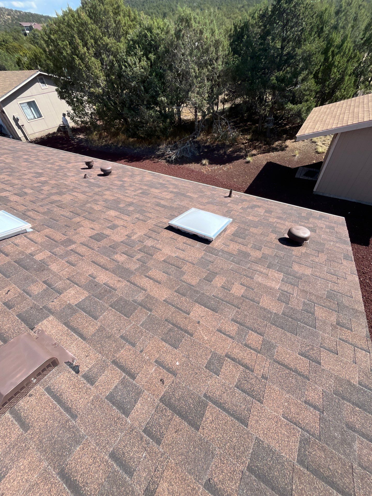Mission Brown Shingles by Reimagine Roofing