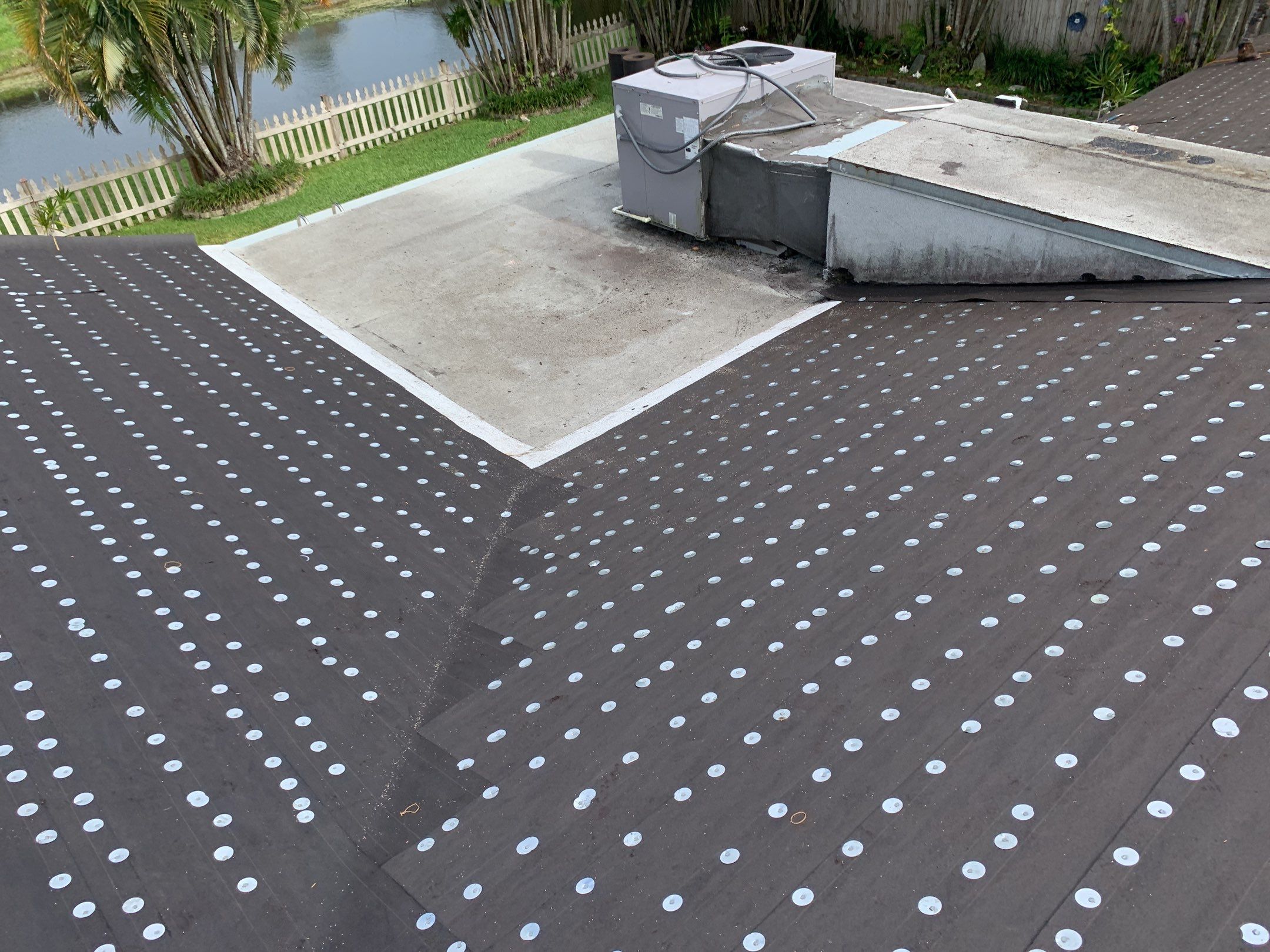 Residential Roofing Installation using 1" Nail strip metal roof by BLUES BROTHERS ROOFING
