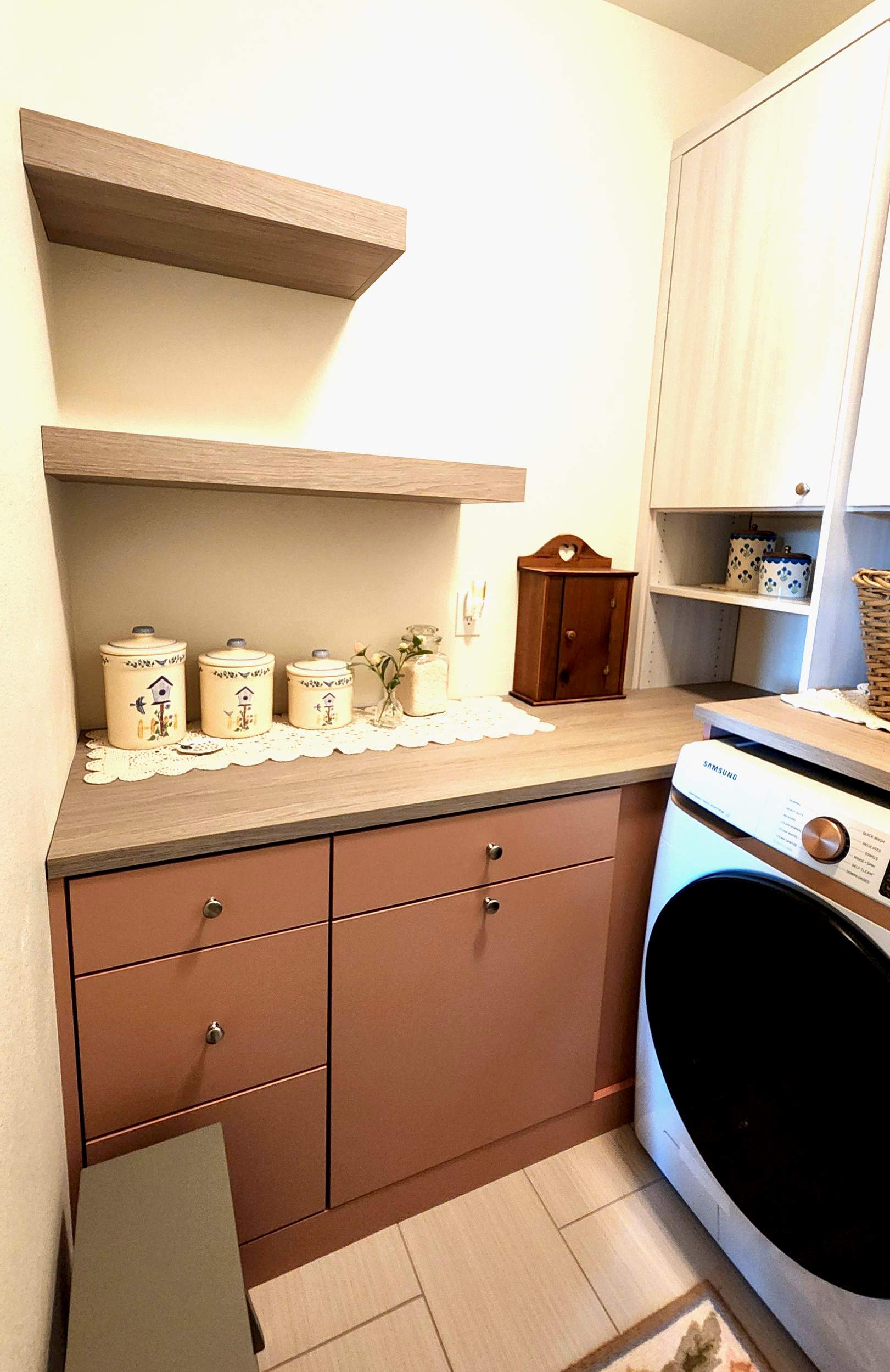 Laundry Room designed to match closets by Concept 32, Inc.