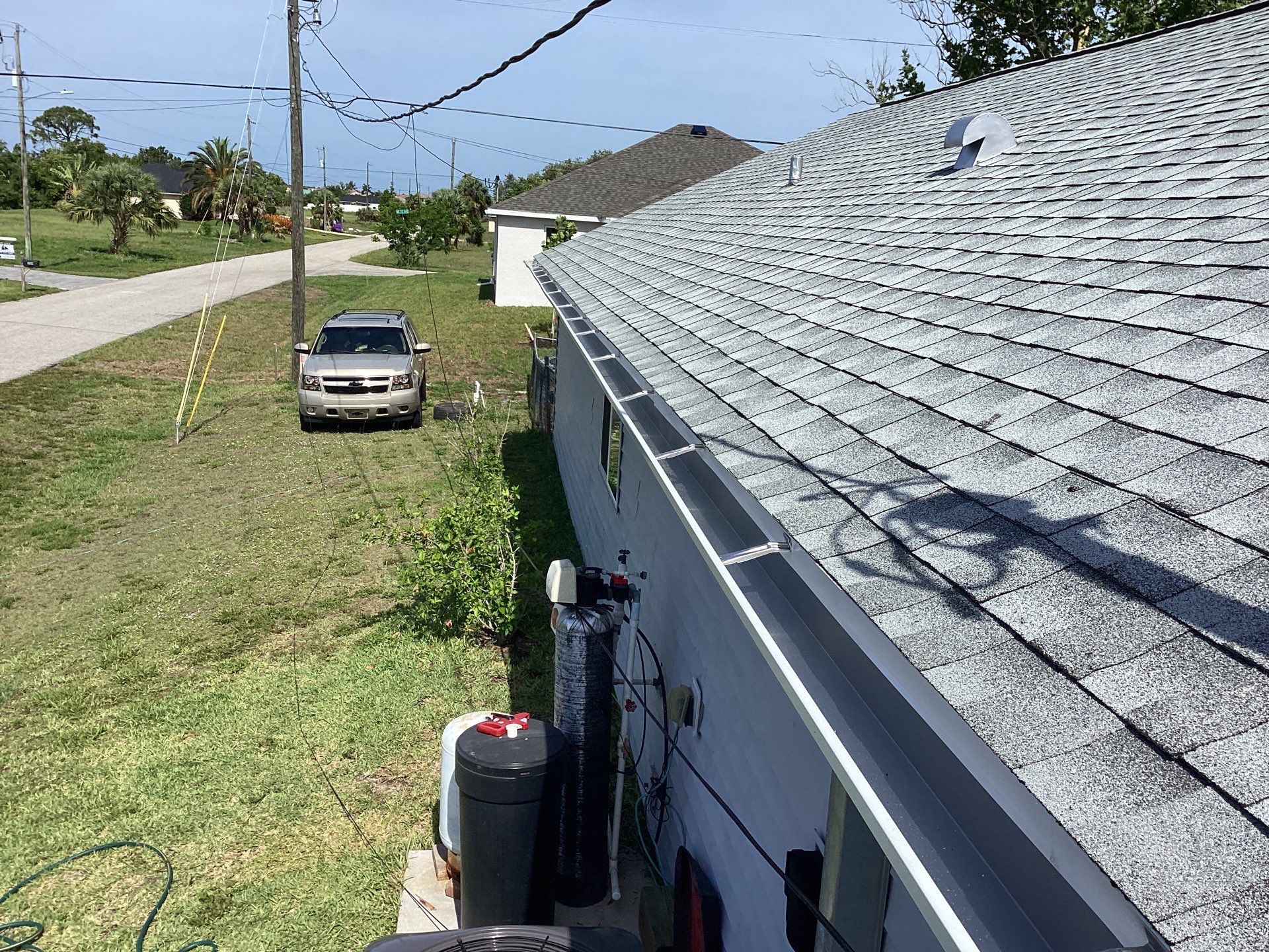 Aluminum Seamless Gutters using Splash Guard in Cape Coral FL by Gutter Professors