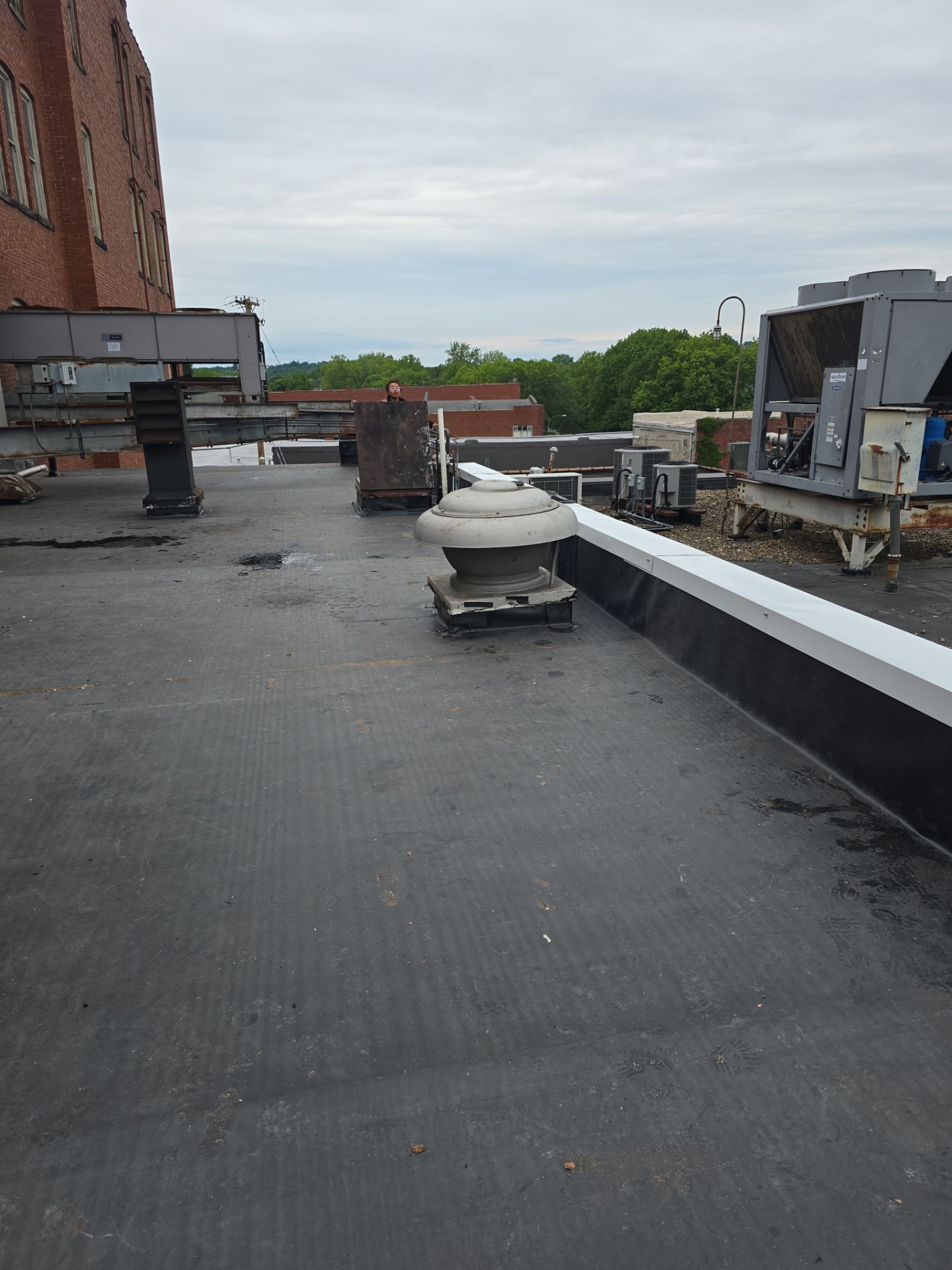 Commercial Roofing Installation using EPDM  by Rainstoppers Roofing