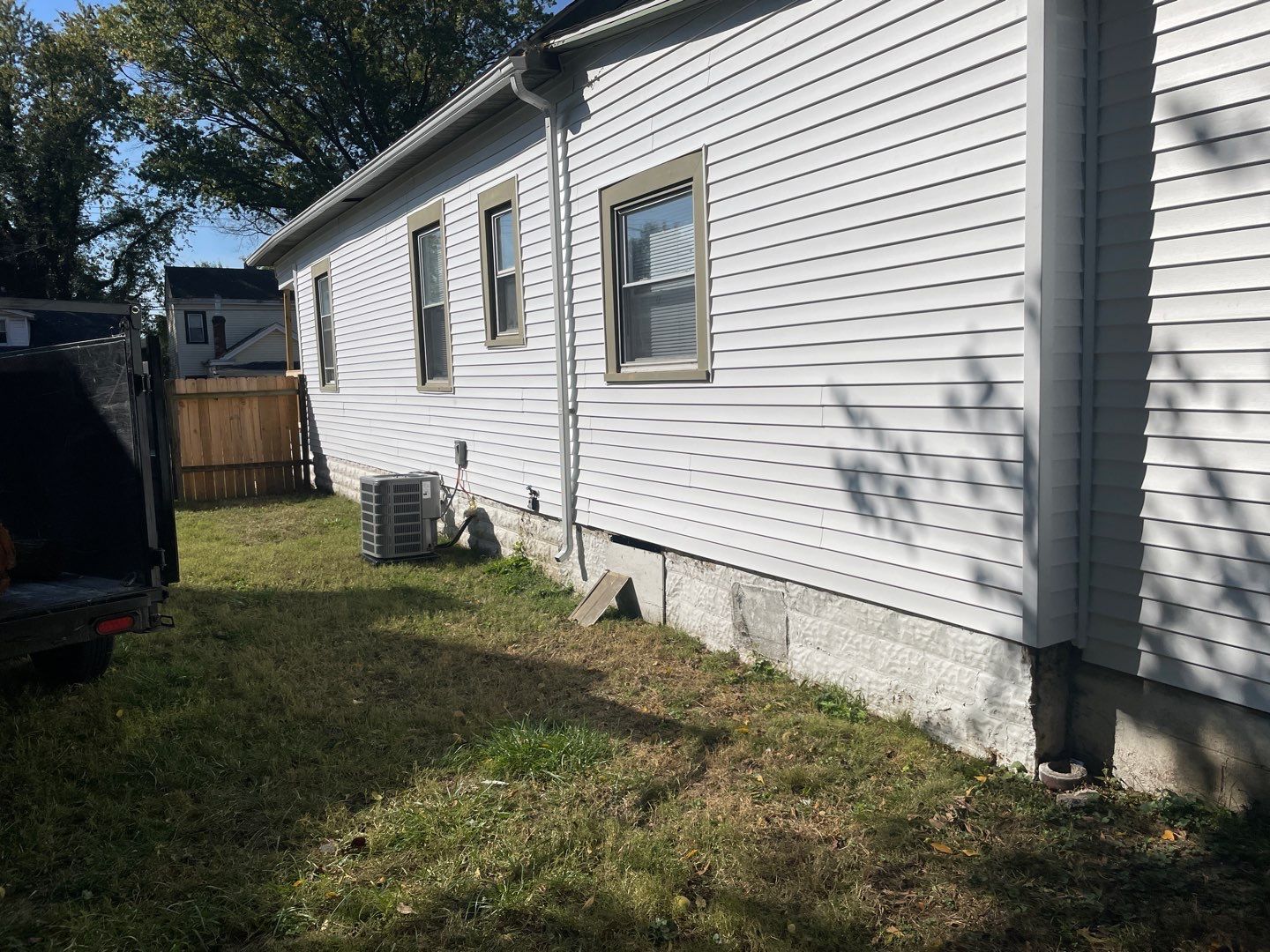 Rental Property Restoration, siding, flooring, gutters, landscaping by Storm Contracting 