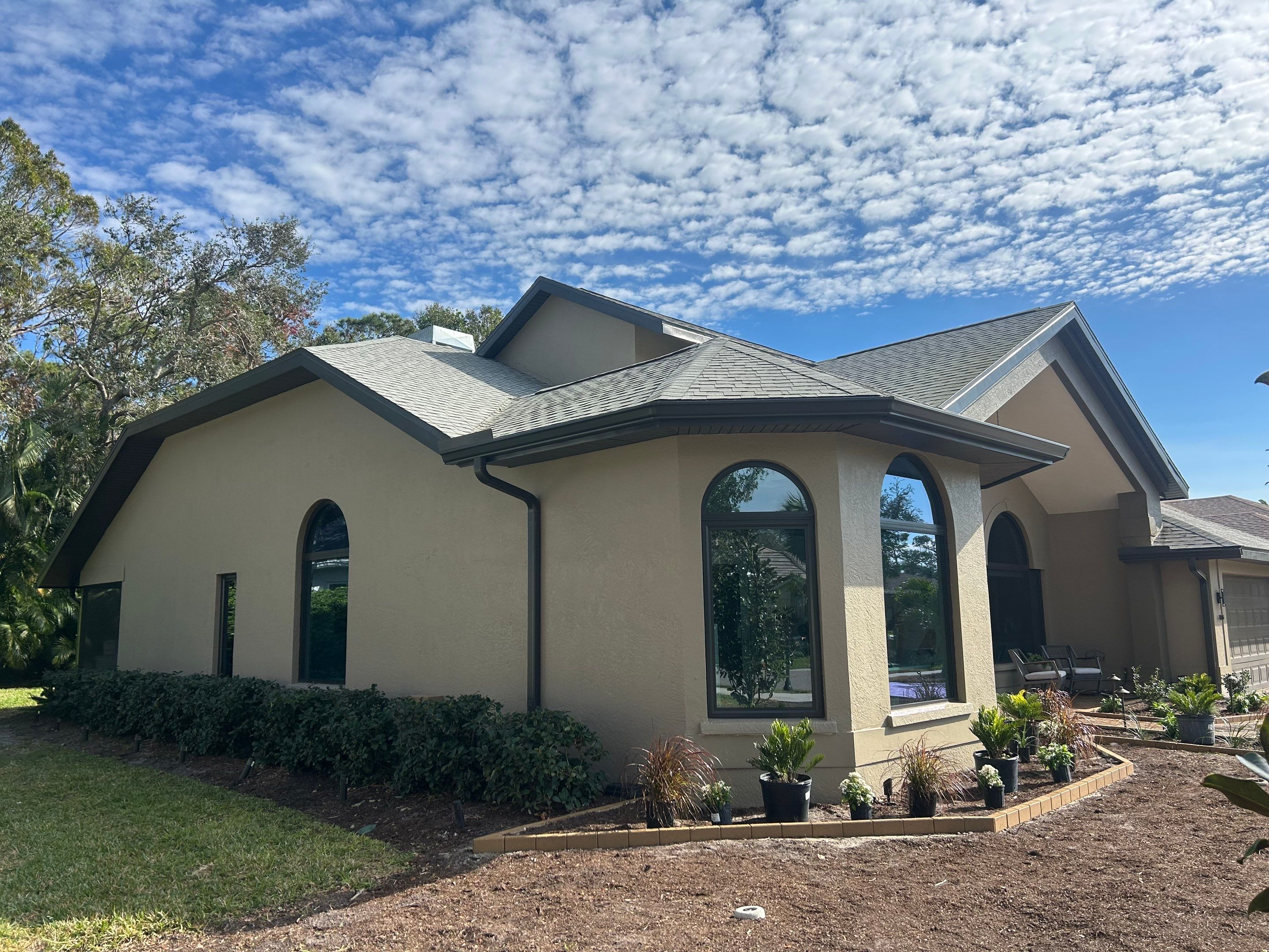 Black Seamless Gutters in Sarasota FL by Gutter Professors