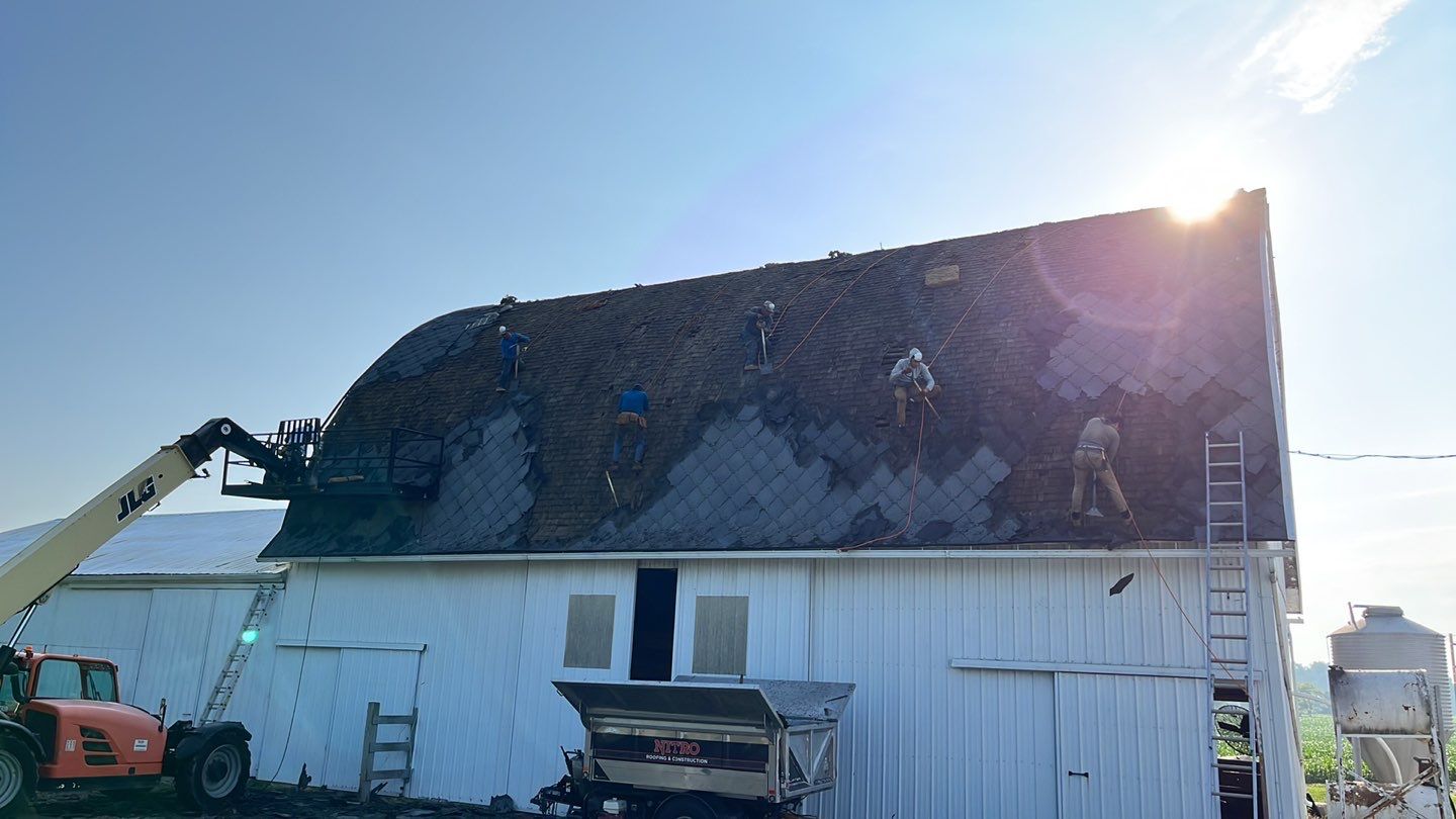 Barn Roofing Installation using GAF Timberline HDZ Charcoal by Nitro Roofing and Construction