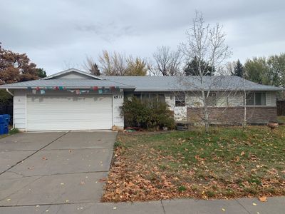 Boise single level low pitched roofing installation using Owens Corning in Teak