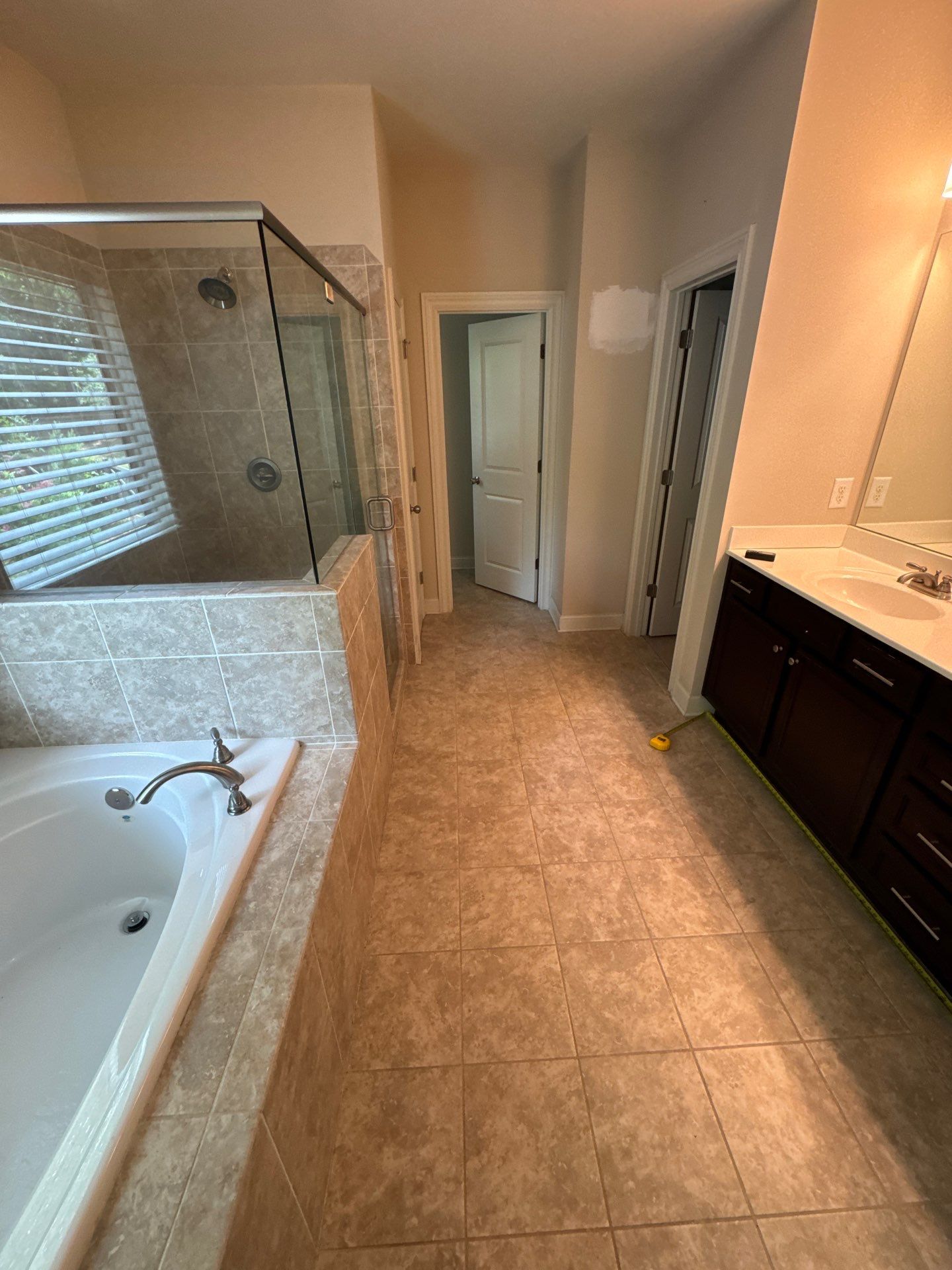 Master bathroom renovation using Free standing tub by Prudencio