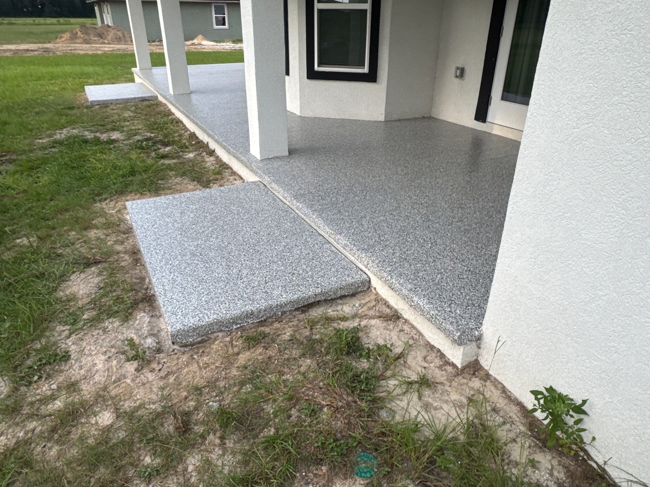 Porches Project in Brooker, FL in Slate Stone by Cross Creek Concrete Coatings