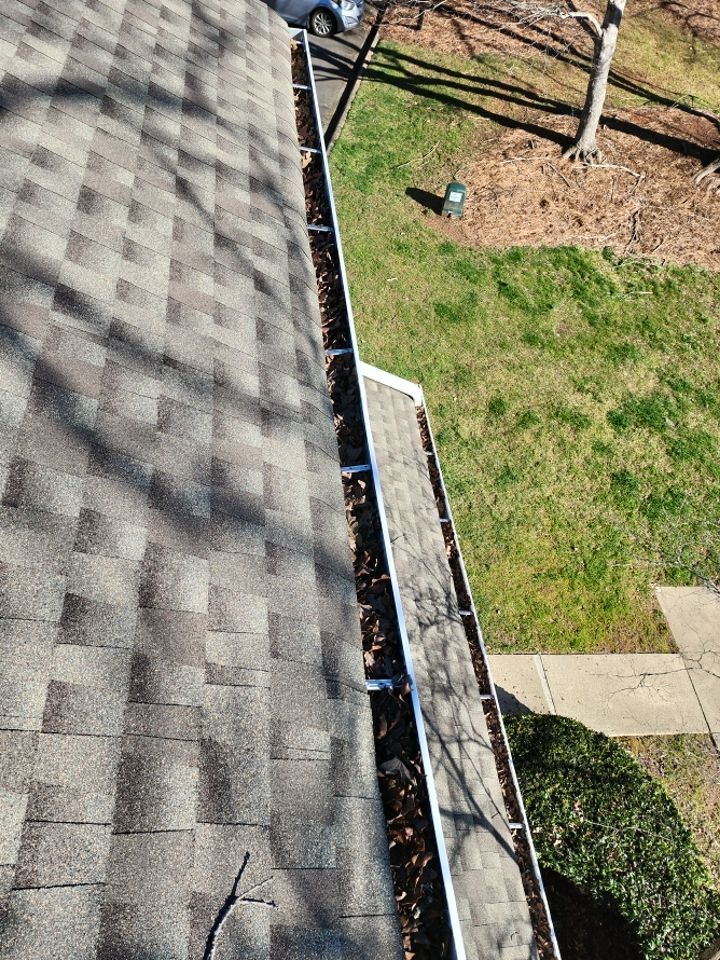 Gutter Cleaning using water by Power Wash Masters LLC