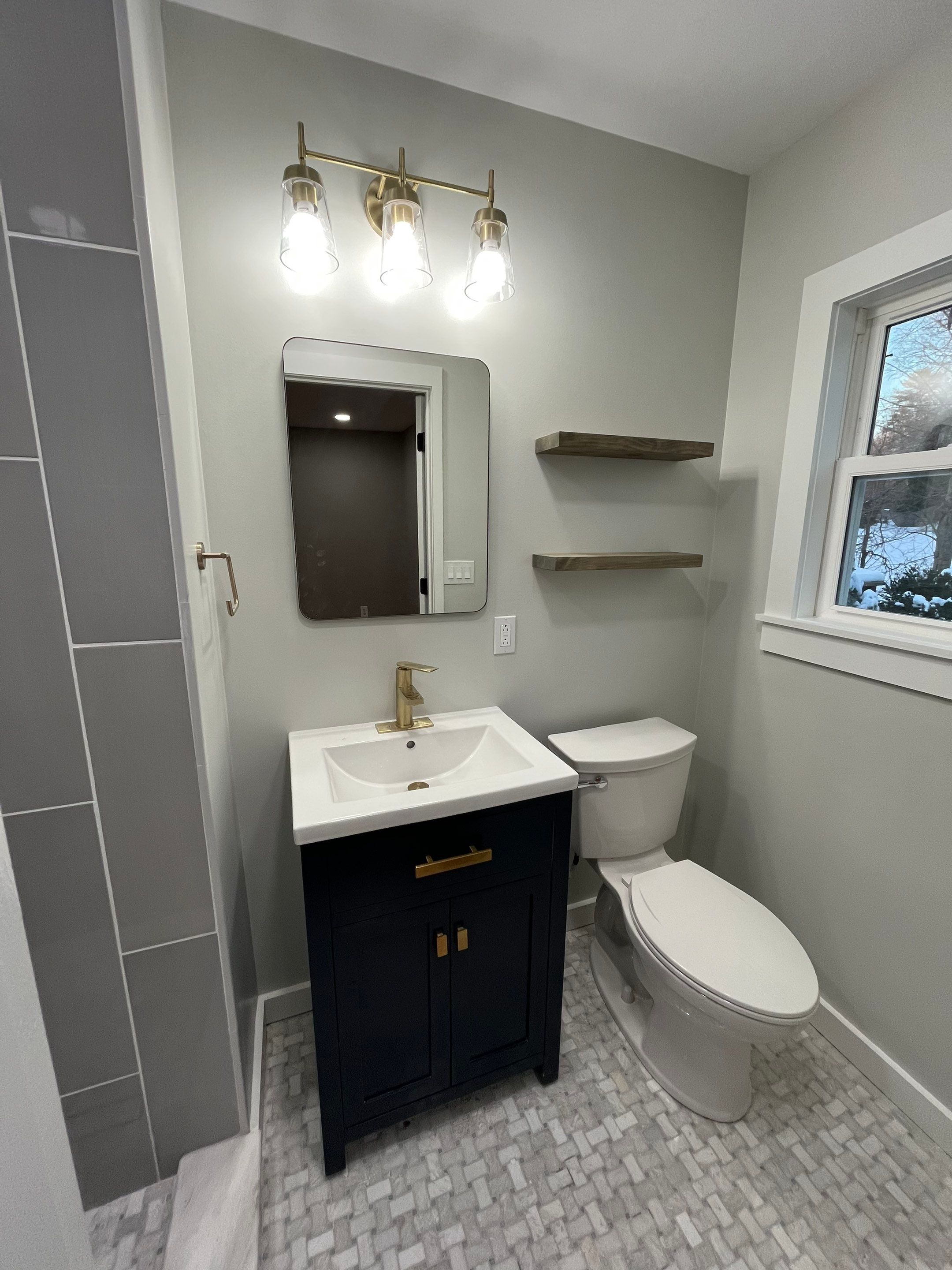 Bathroom Remodel using Tile by Home Concepts Construction