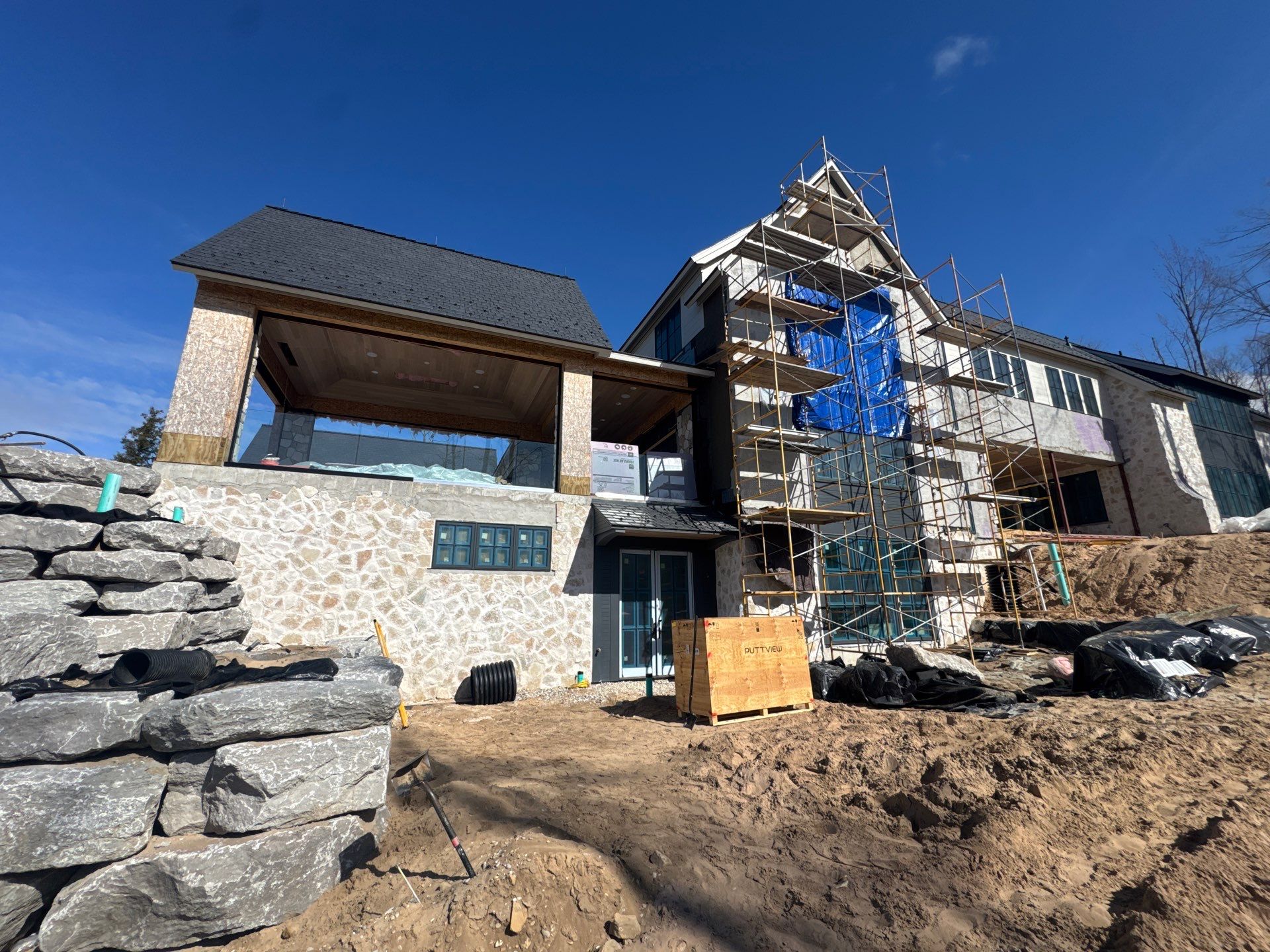 Half Round Gutter Installation for Petoskey Residence by Rainbow Seamless Systems