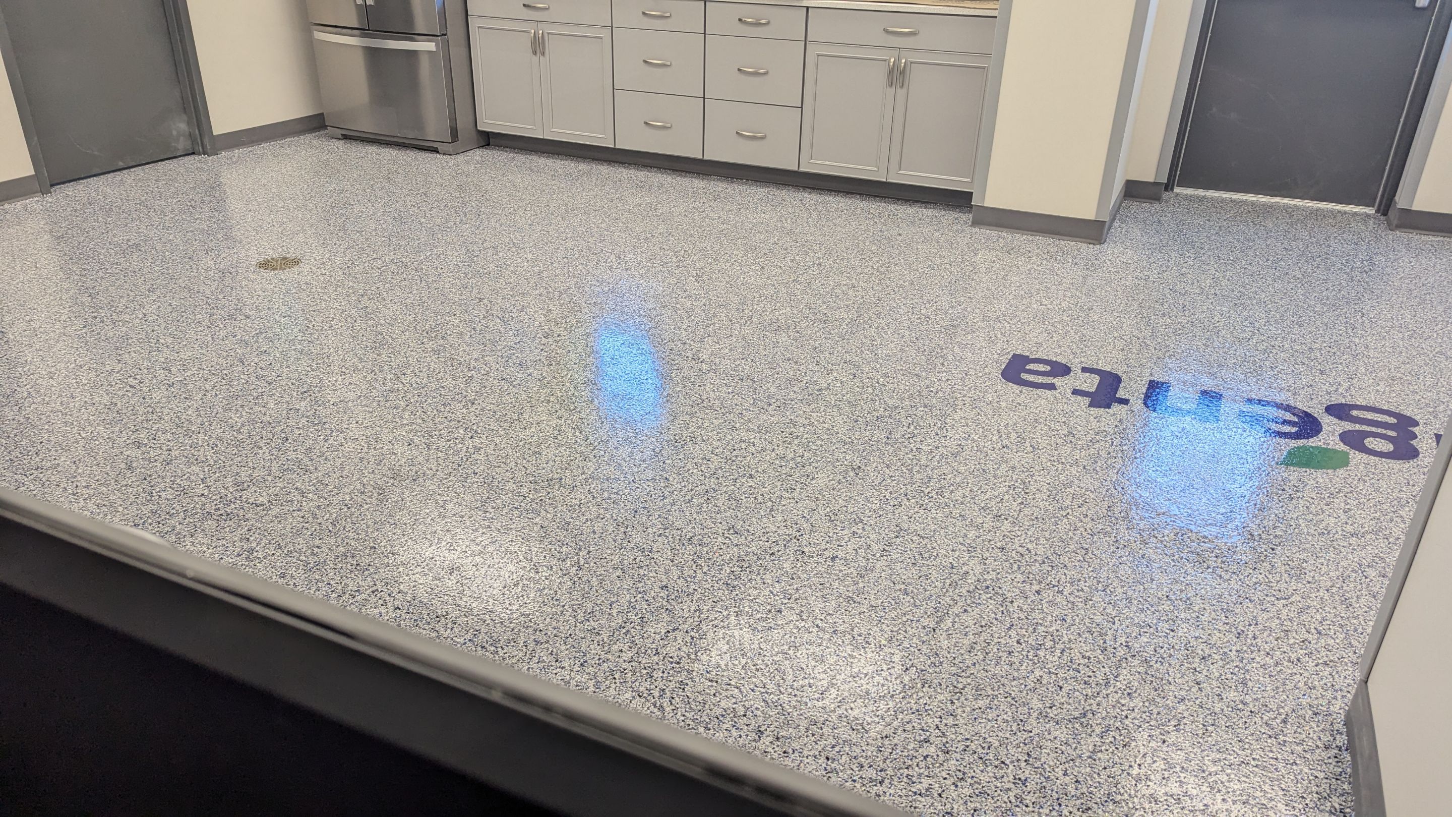 Commercial Floor Transformation using Aurora Accent W/Hypnotic Blue by Croc Coatings, LLC