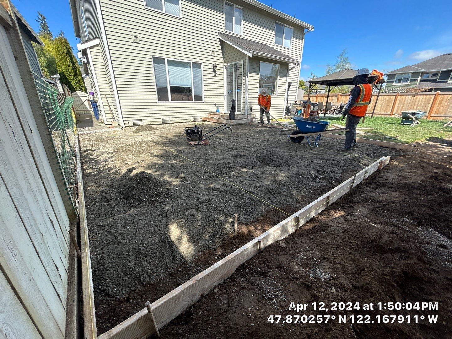 Benedict | Stamped Concrete Back Patio by Jireh Asphalt & Concrete Inc 