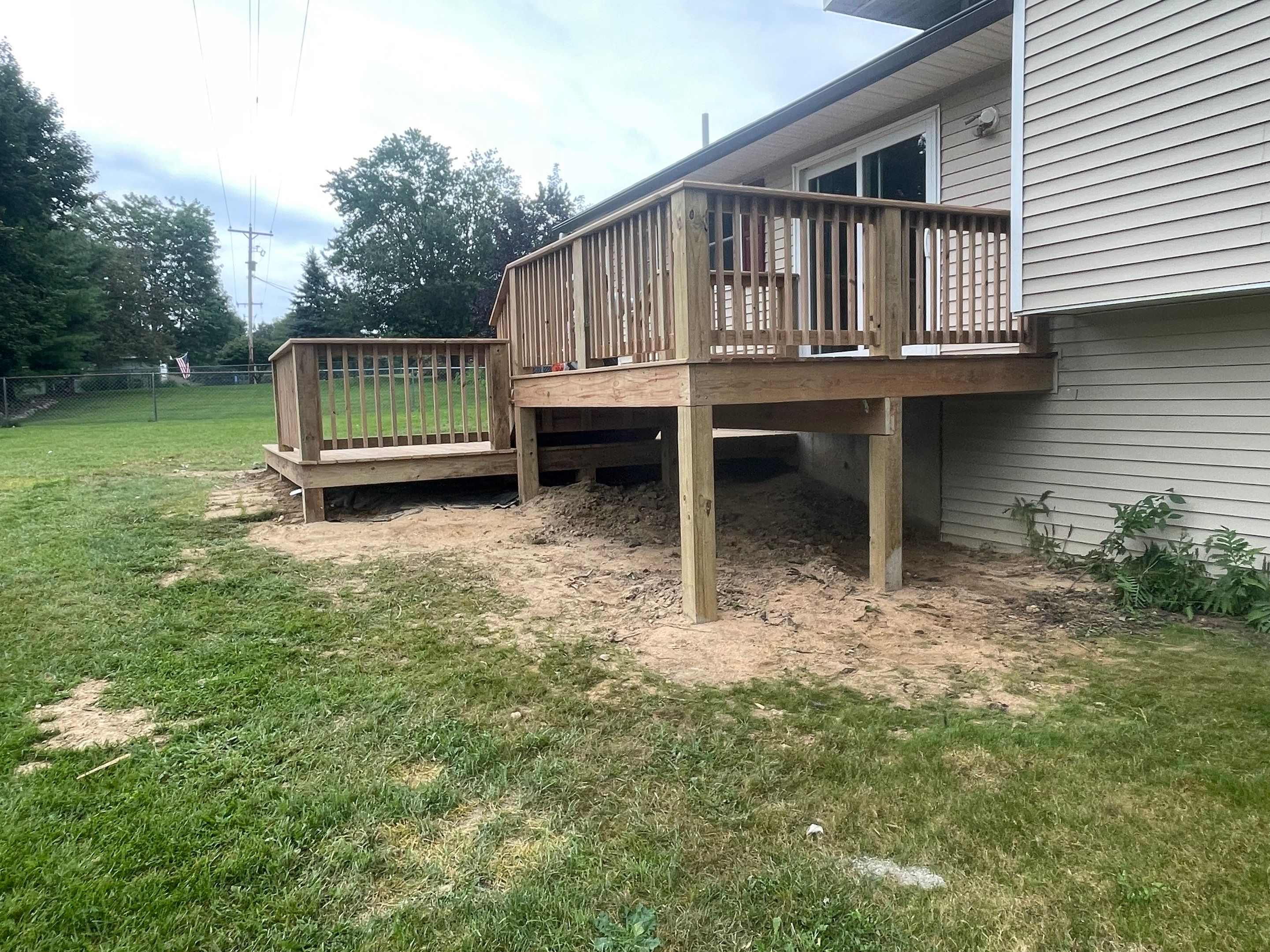 Deck Installation using Treated Lumber by Avalon Roofing and Exteriors