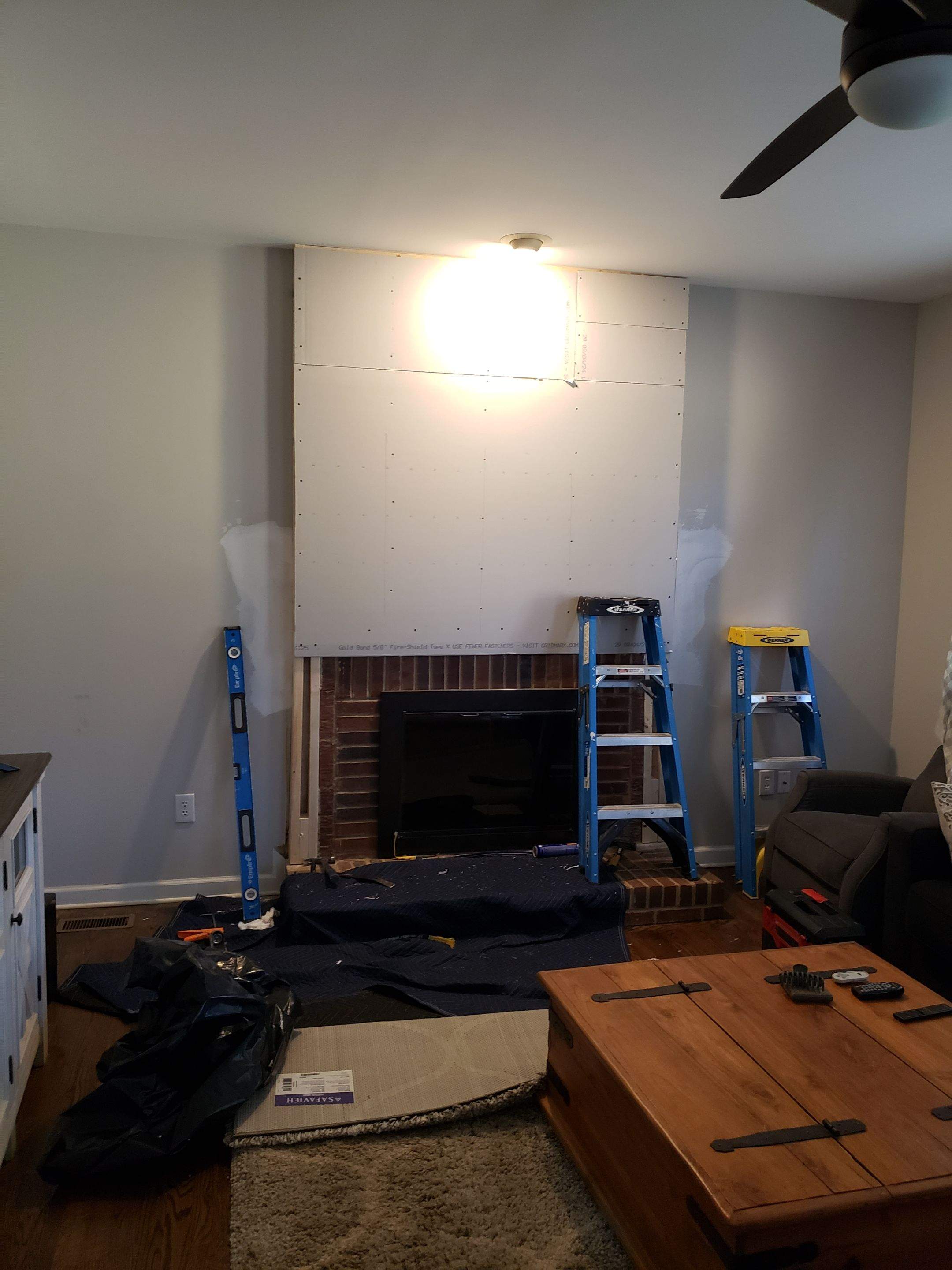 Fireplace Trim Out using Ship Lap by A Step Above Handy LLC 