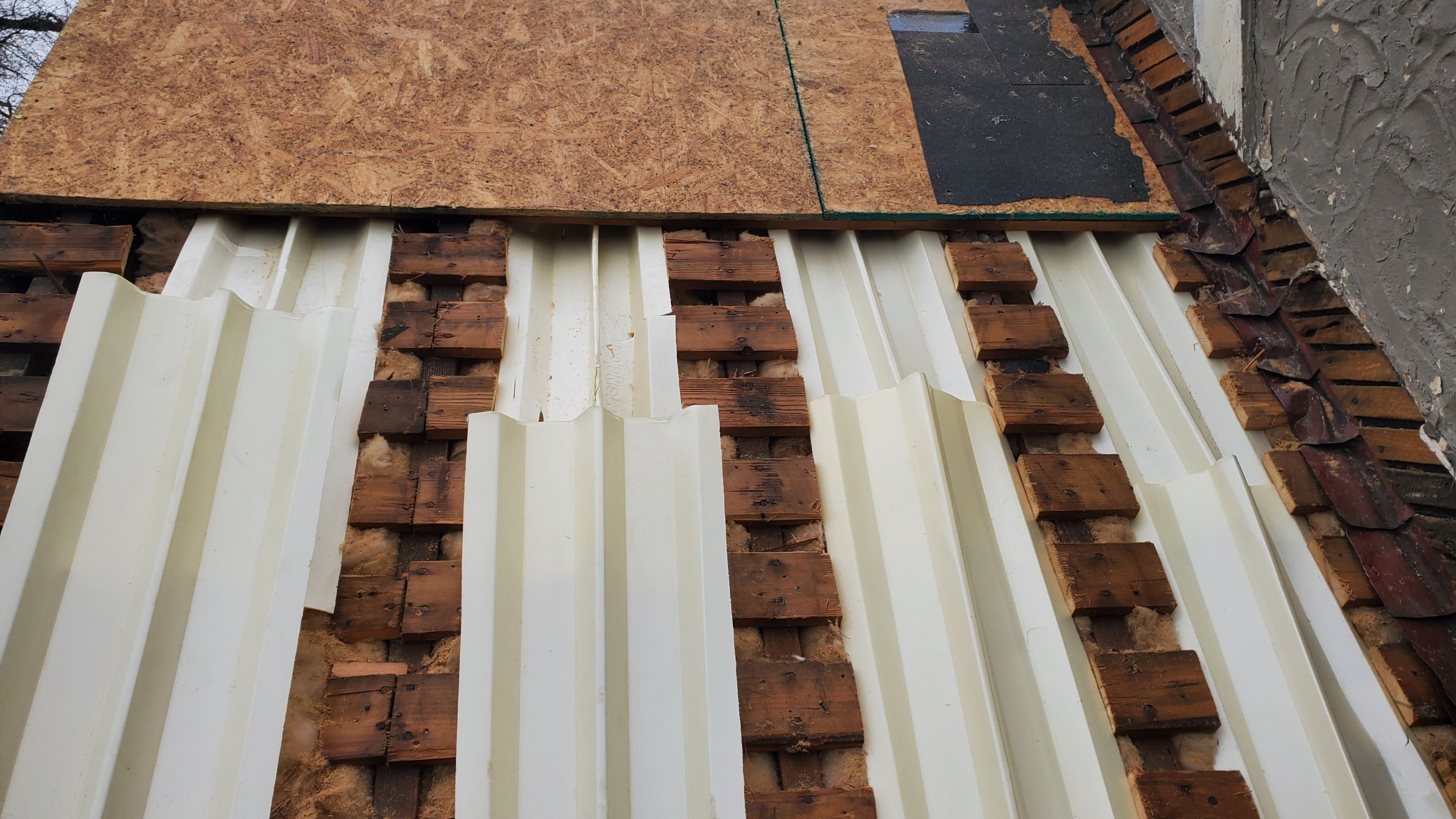 Residential Roofing Installation using Owens Corning inFlow Vent by Absolute Roofing and Construction