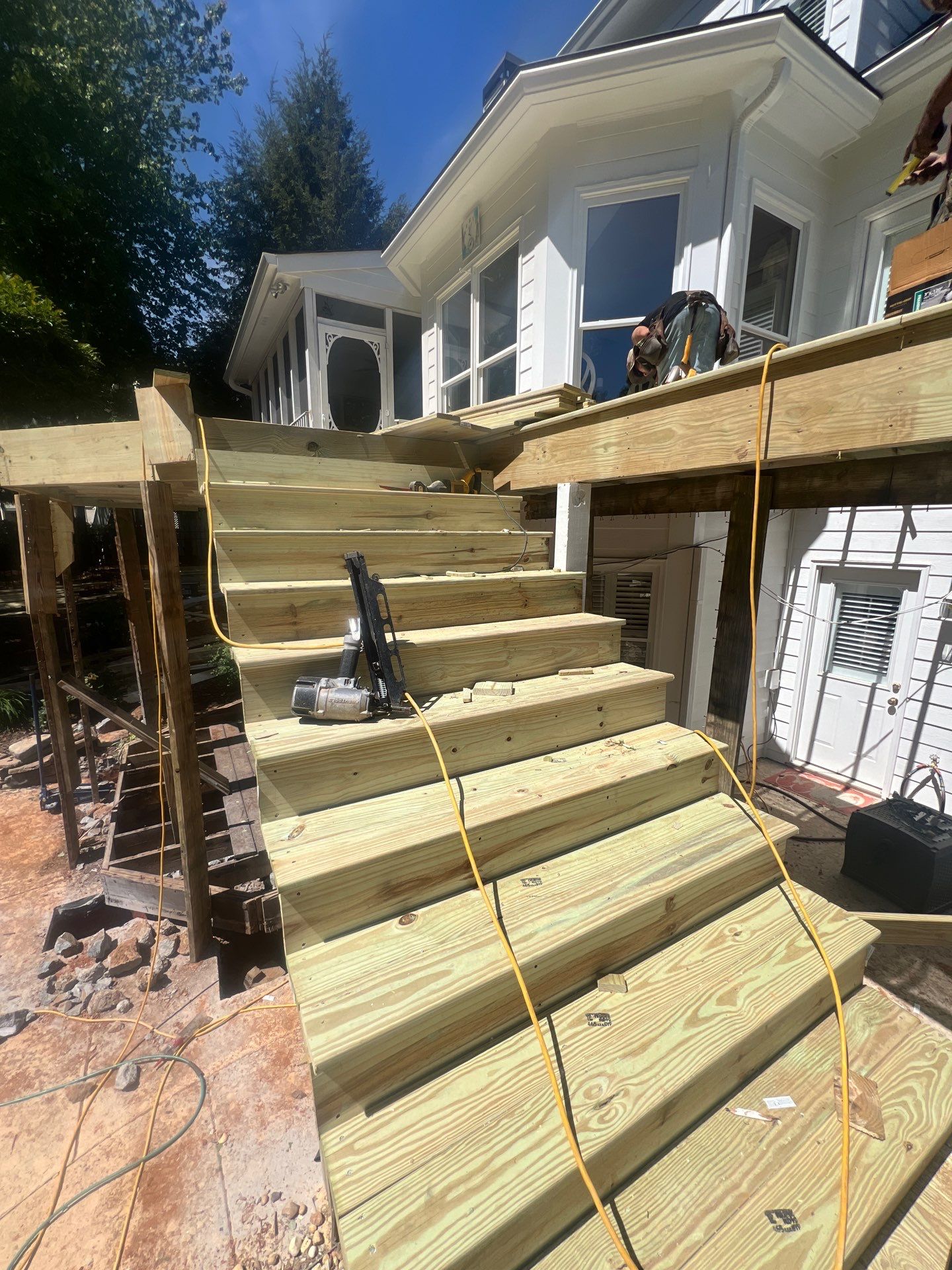 Multi-Level Pressure-Treated Wood Deck and Screened Porch in Acworth by Swift Home Renovations