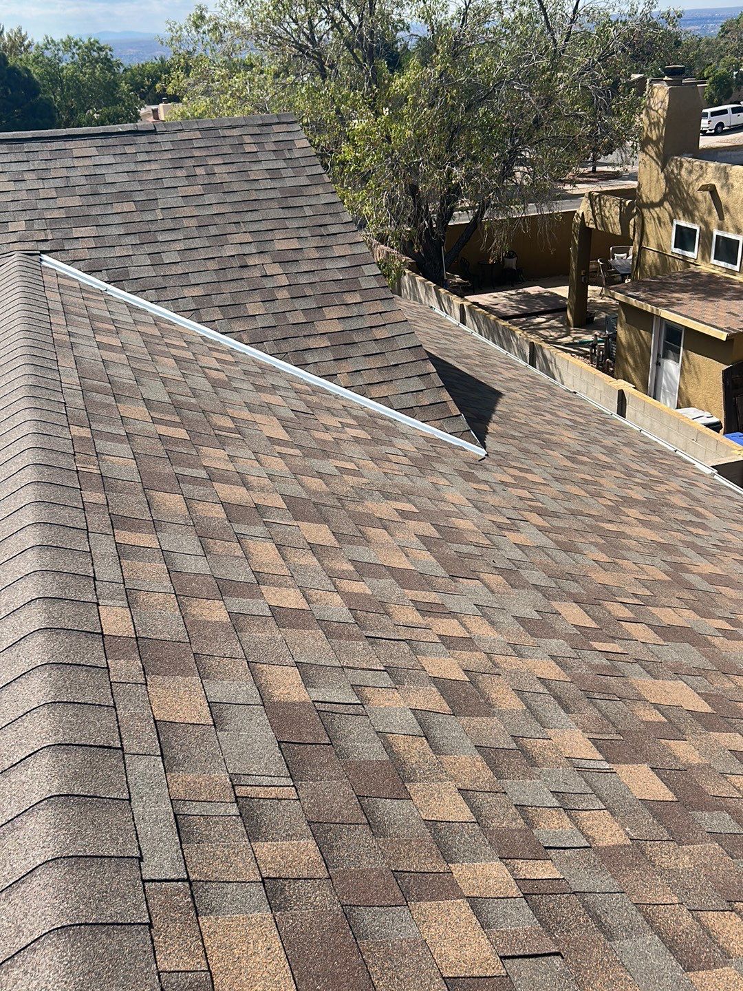Brownwood Shingles by Reimagine Roofing