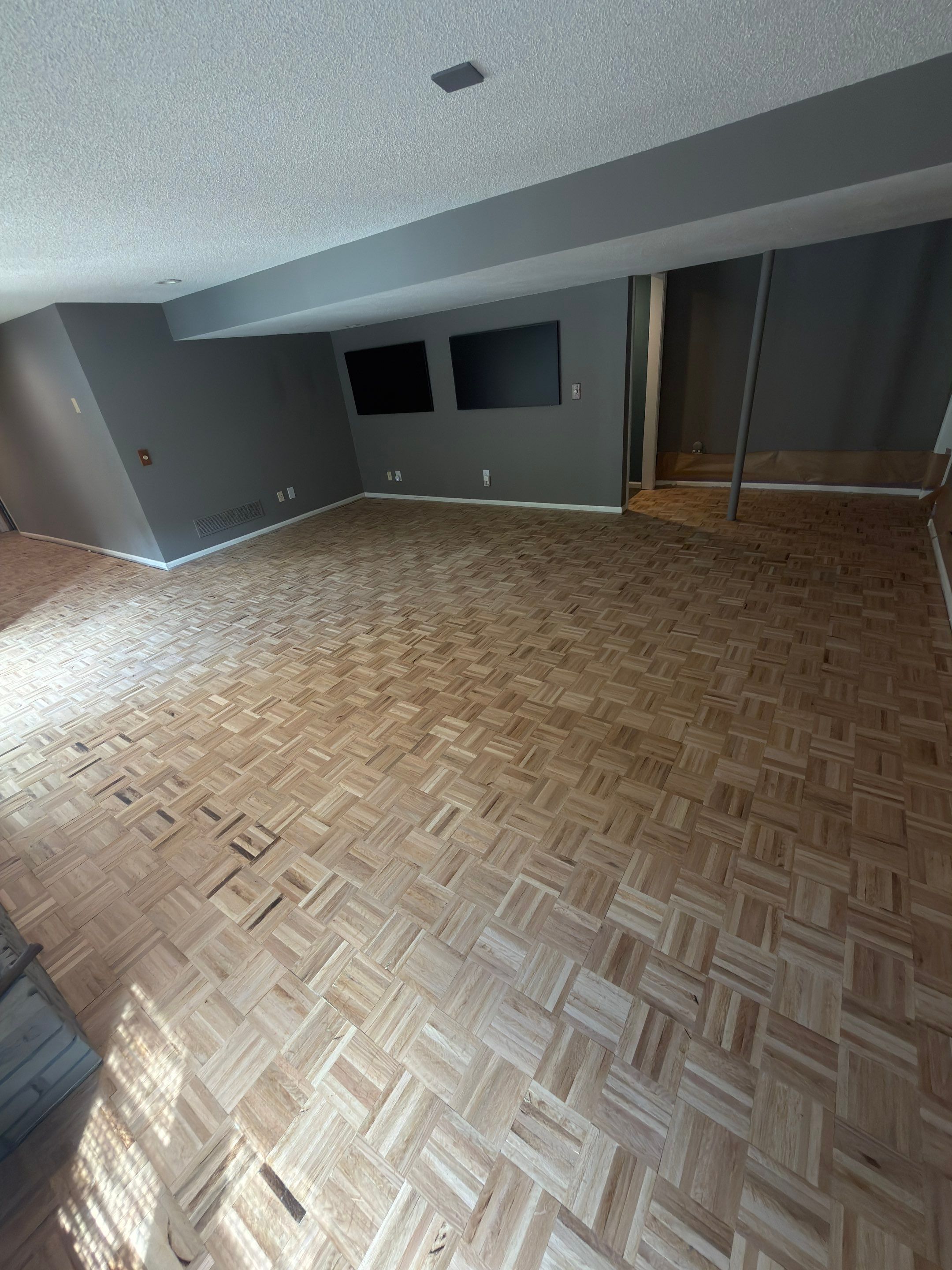 Parkville Hardwood Flooring Renovation Including Custom Parquet Installation by Rippnfinish