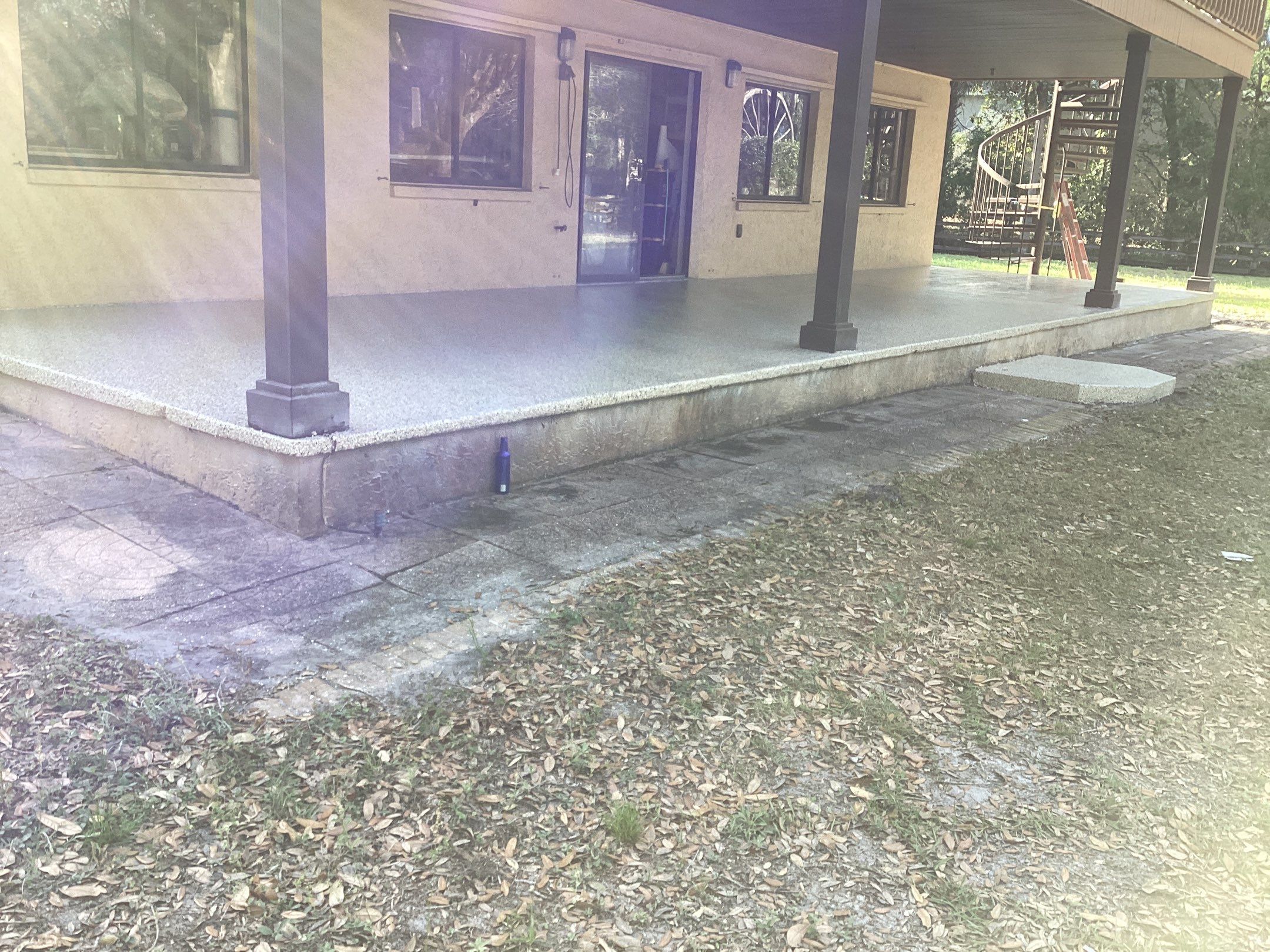 Patio using Pebble Beach by Amvet concrete coatings llc