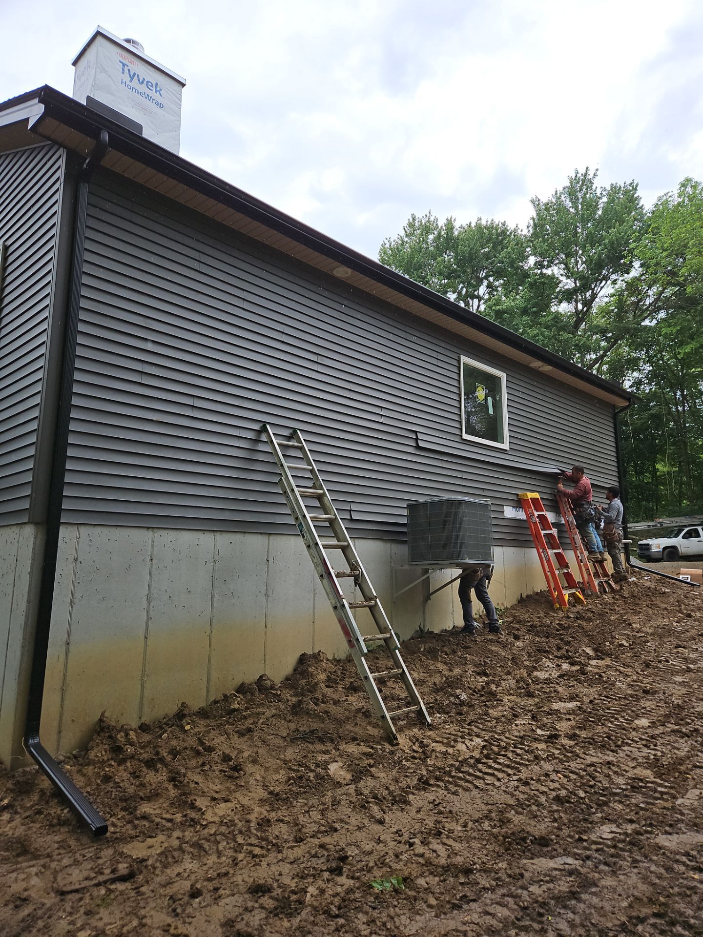 Gutter Installation using 5" Seamless Gutters and Downspouts by RoofX 