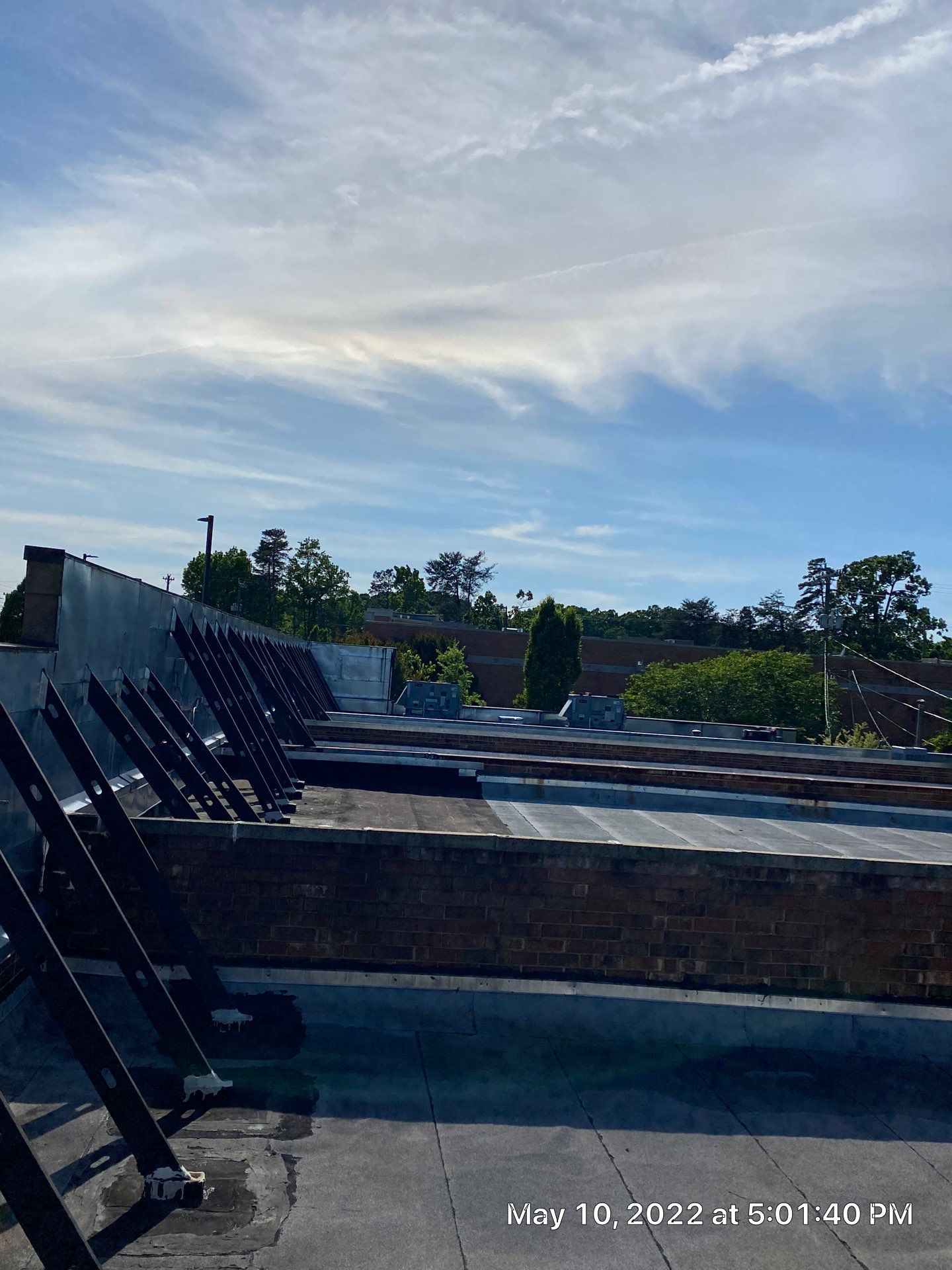 Commercial Roof Coating using Fiberseal basecoat and Silicon Topcoat by Just In Time Roofing and Restoration