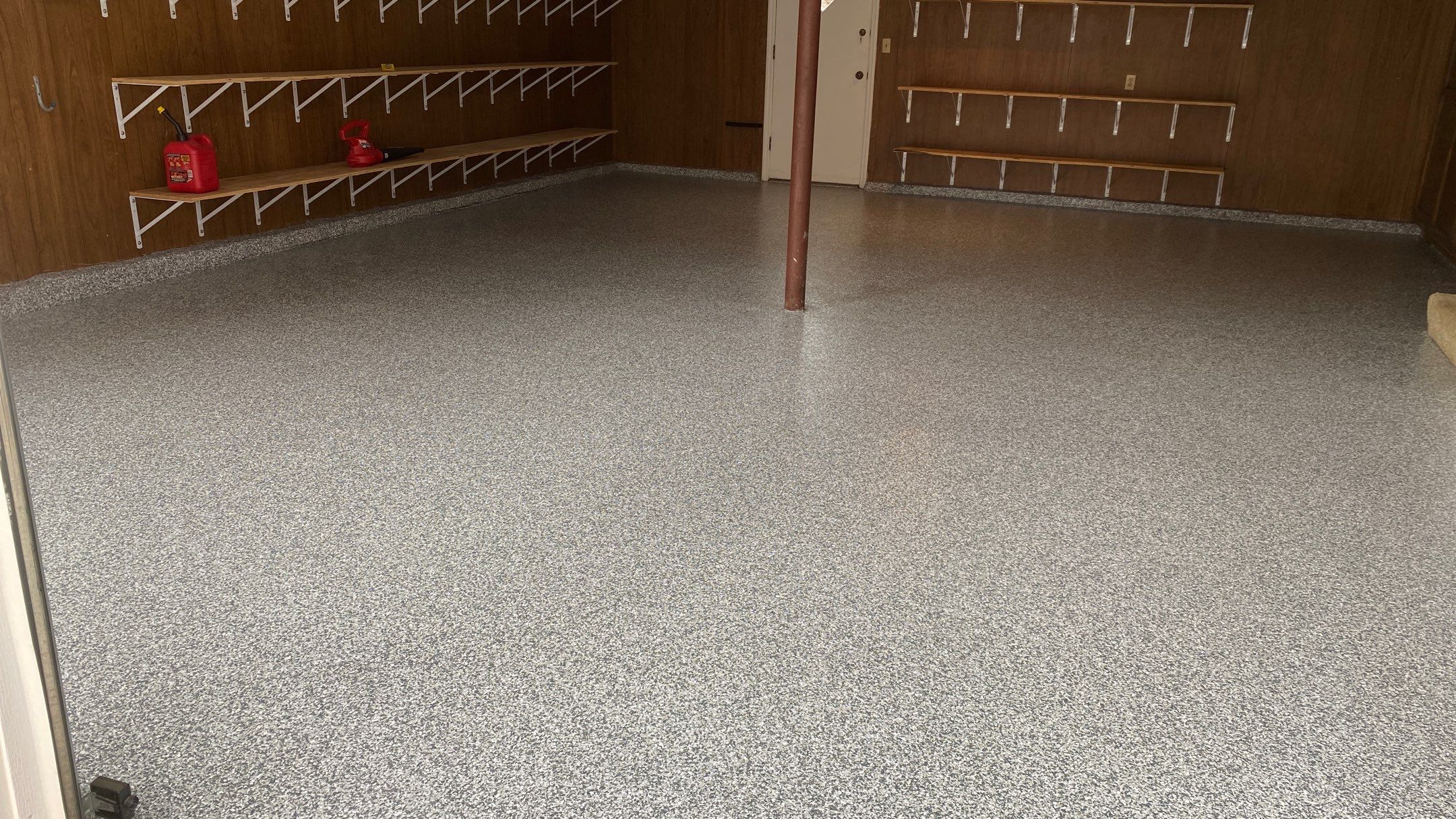 Mary Z. gets a new garage floor! by Banner Garage