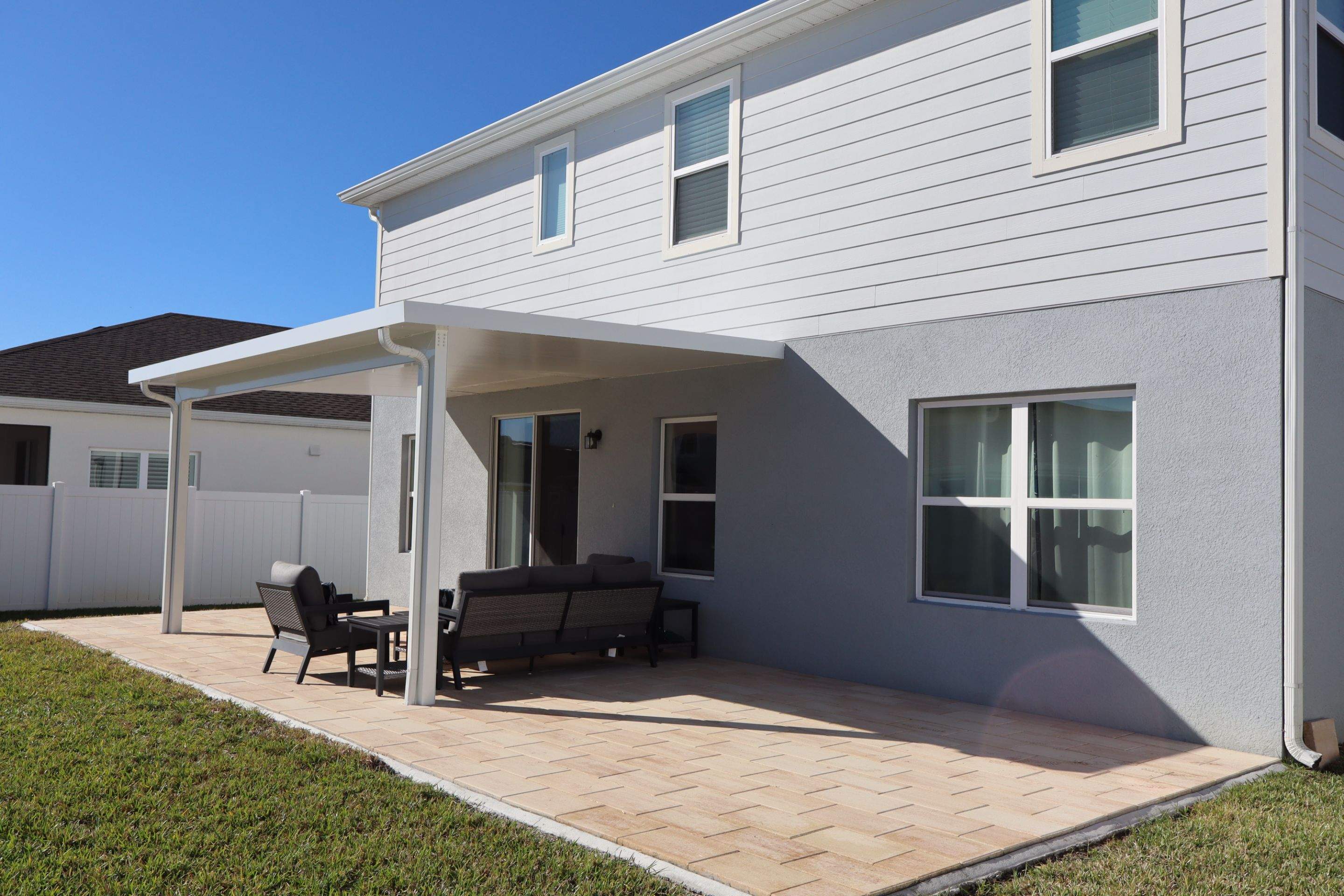 Patio cover and pavers  using Aluminum  by Orlando pergolas 
