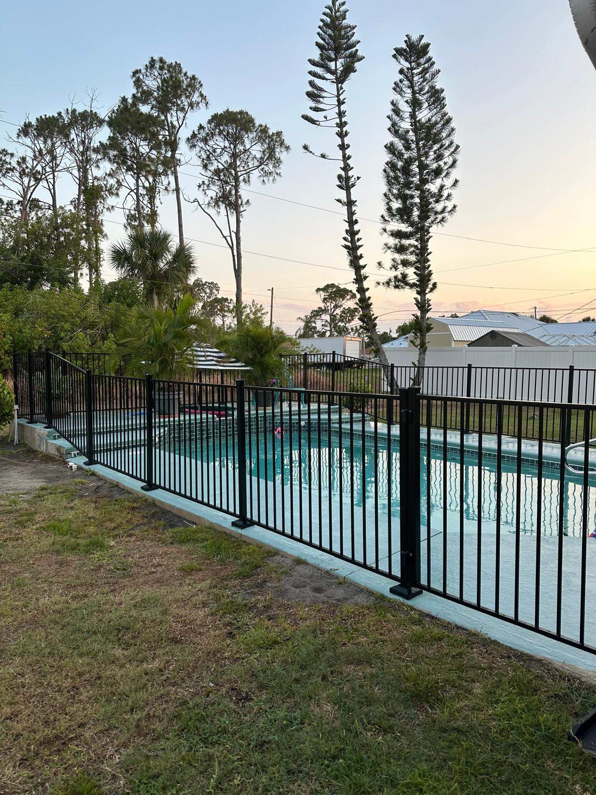 Black Aluminum Pool Fence Installation in Port Charlotte by True Fence LLC
