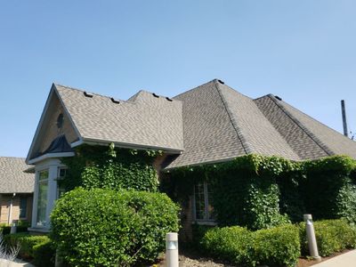 Asphalt Roof Replacement and Aluminum Gutter Installment 