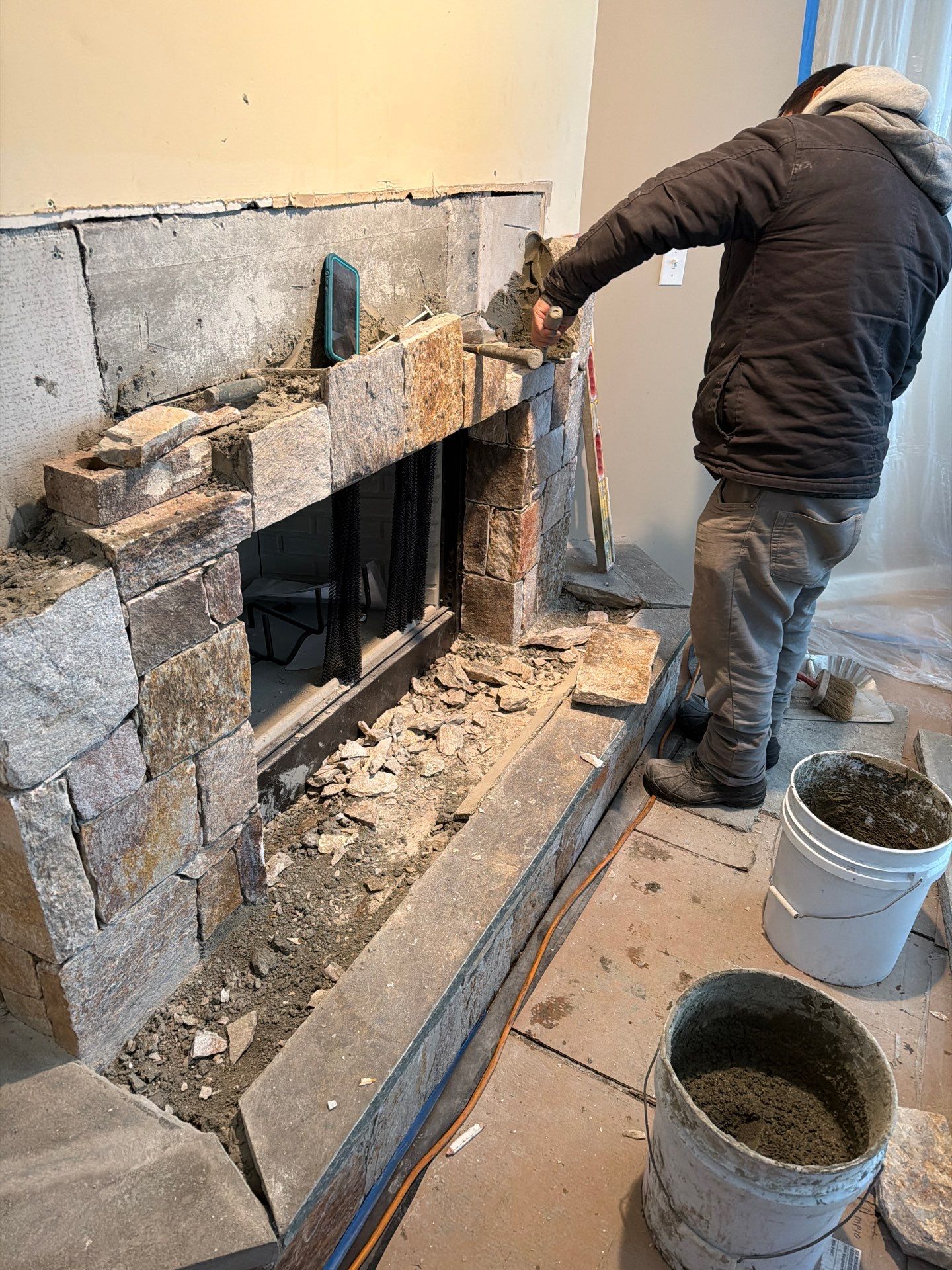 Wood Fireplace w/ Reused Stone by Neighborhood Chimney Services 