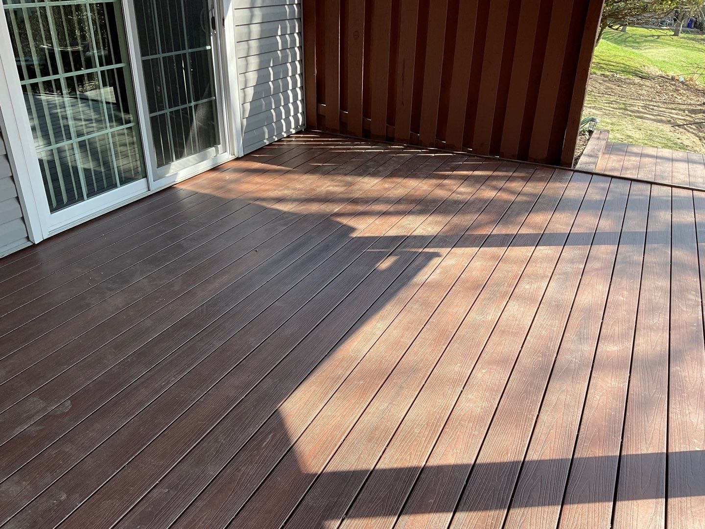 Deck Installation using New Composite Deck Board by Alpha Design Services