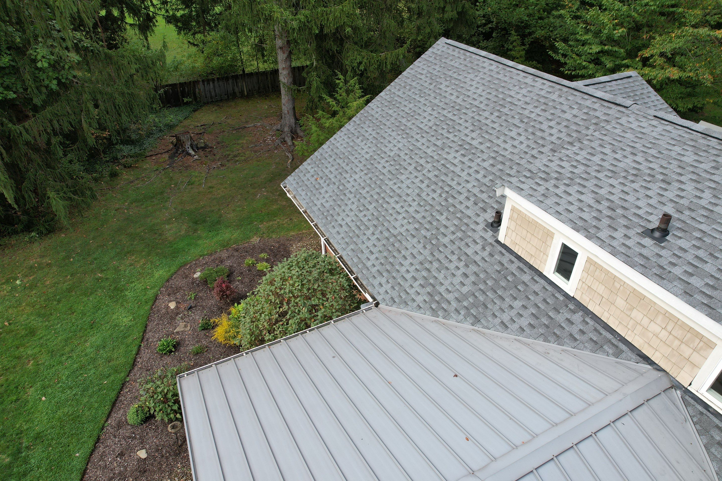 Moreland Hills Roof + Gutters Replacement by Atlas Roofing & Restoration