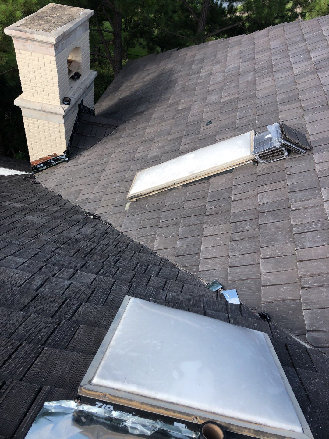 Designer Residential Roof with Zip System by Springtree Restoration