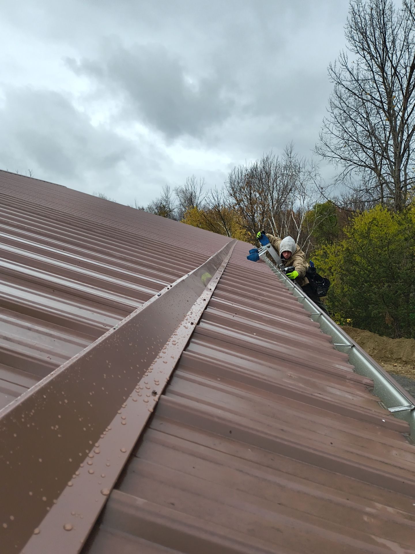 6-Inch Royal Brown Seamless Gutter Installation with Snow Rails – Monticello, MN by Next Level Seamless Gutters / Exteriors Inc.