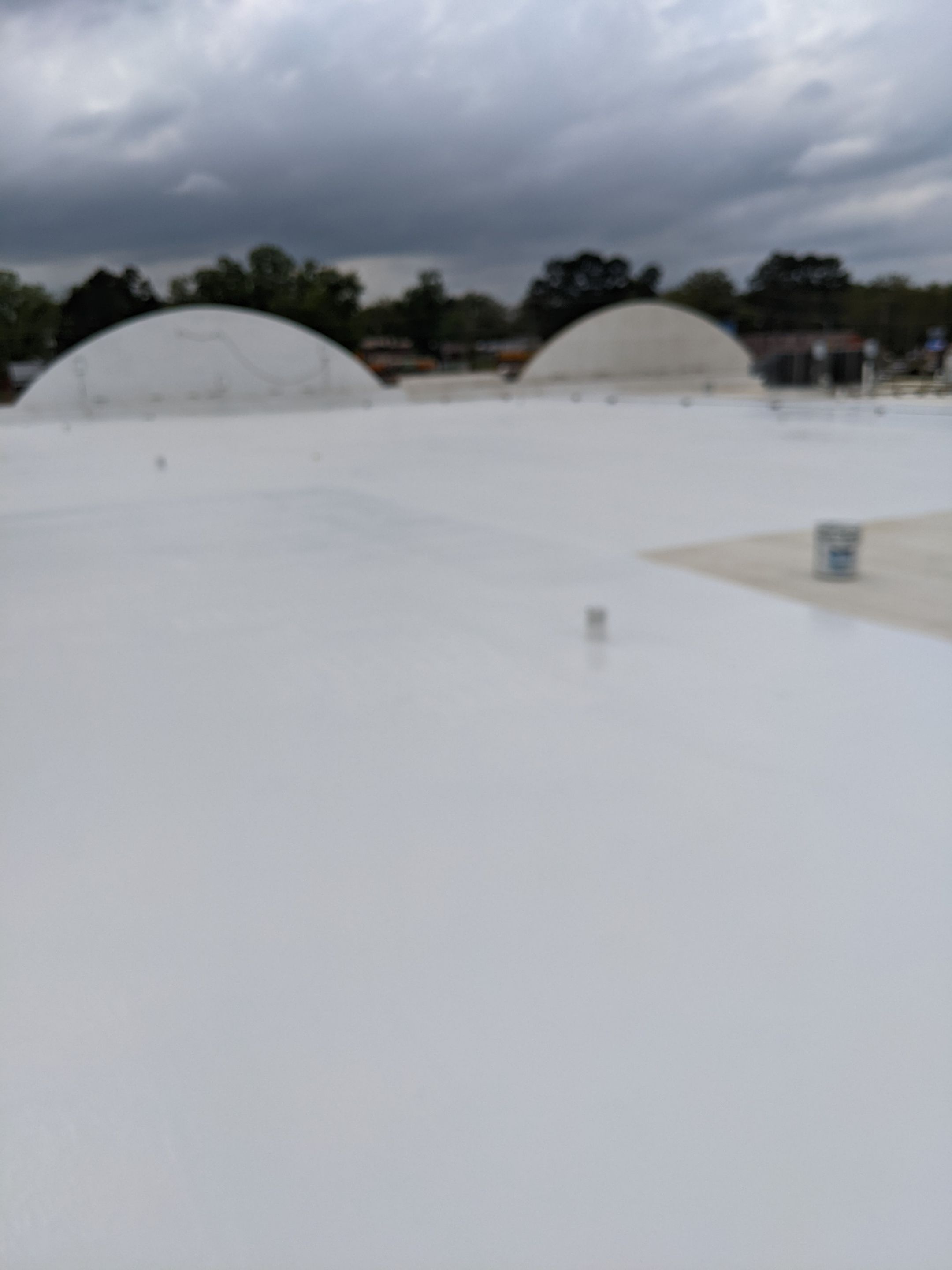 Commercial Roofing Installation using Aldocoat Coatings by Hostetler Roofing