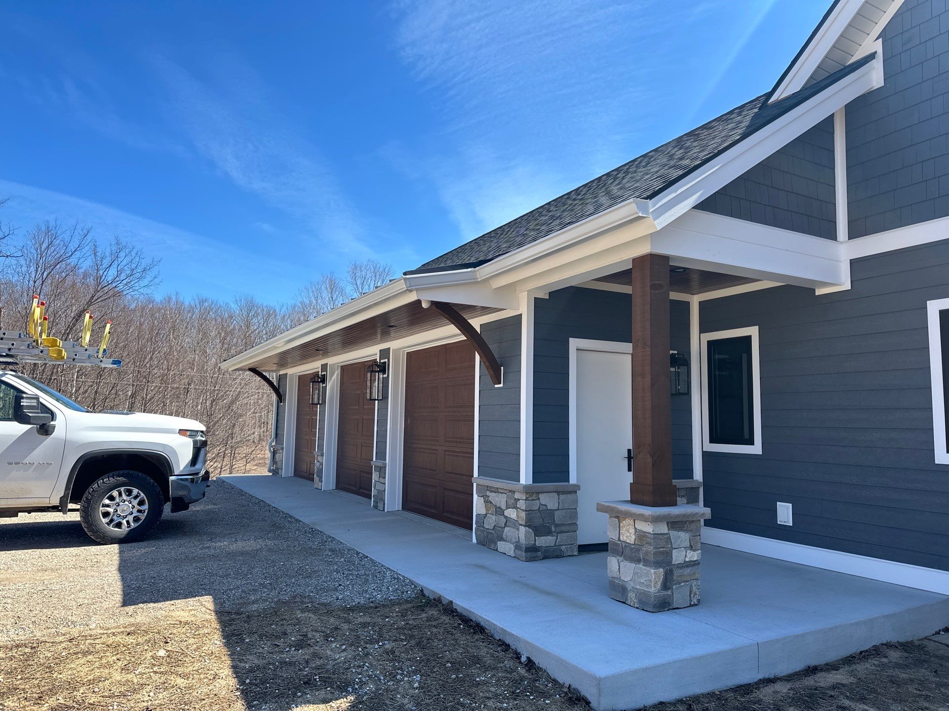 Residential Gutter and Downspout Installation for Ellsworth Home Exterior by Rainbow Seamless Systems