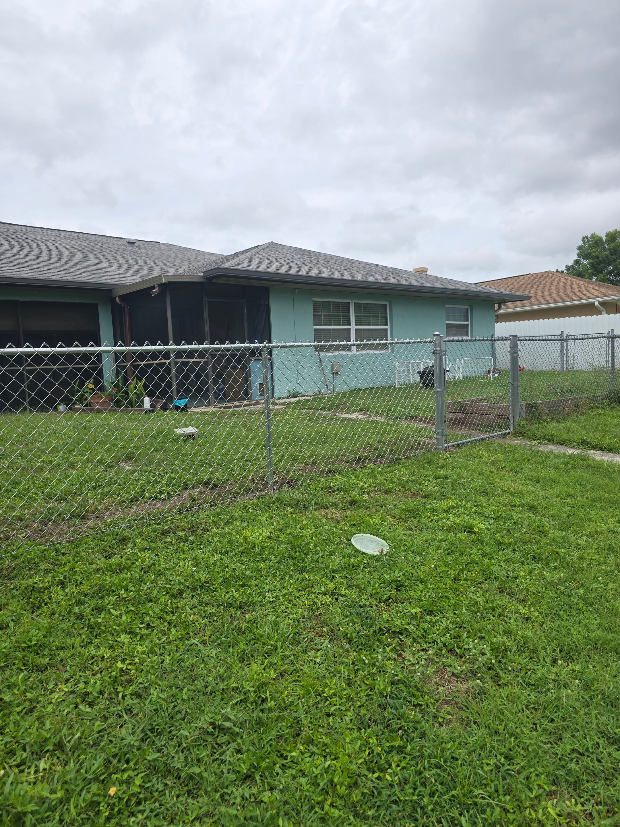 New Galvanized Chain Link Fence and Residential Gate in Port Charlotte by True Fence LLC