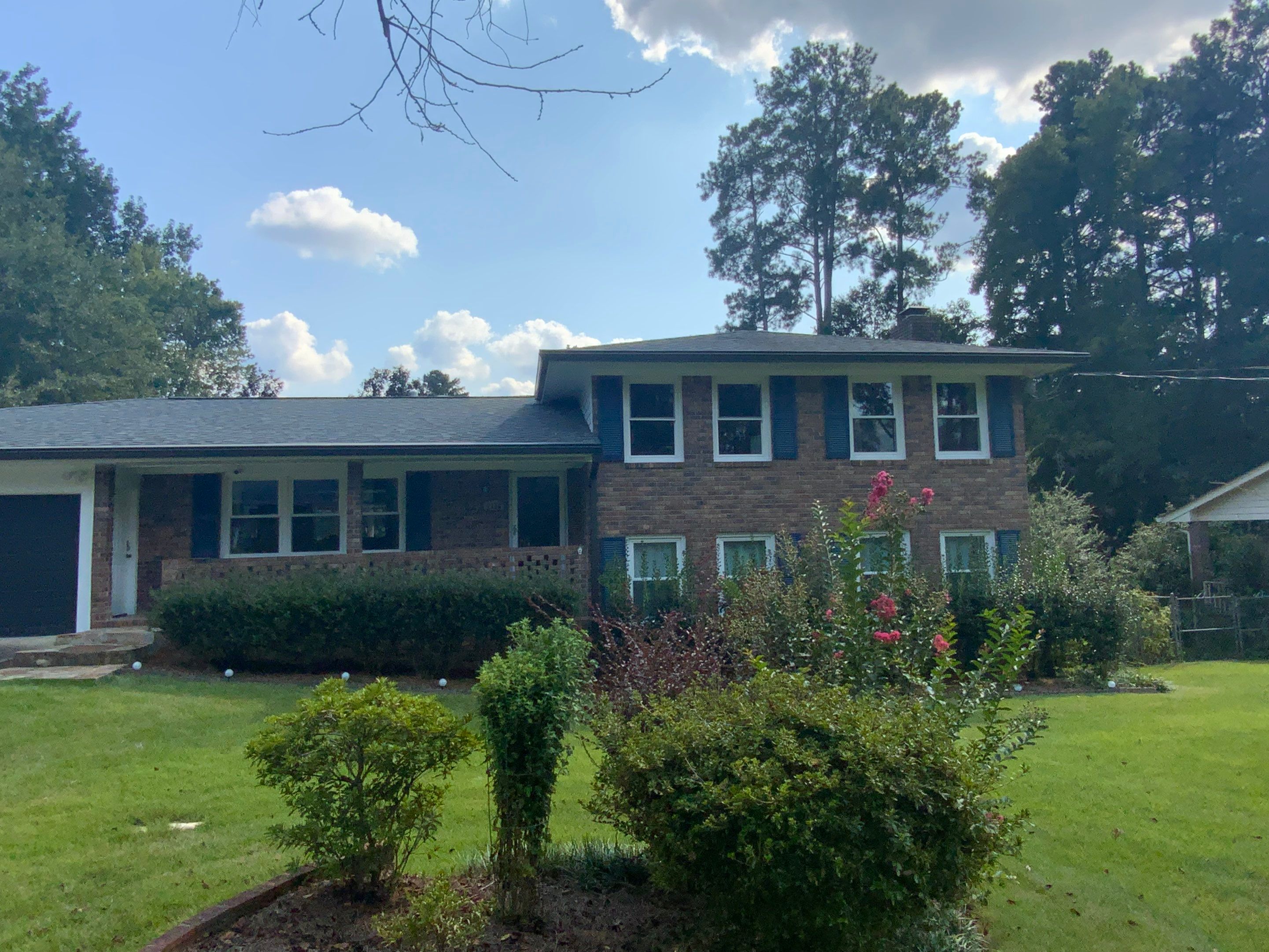 Full Exterior Trim Painting and Multi-Level Deck Staining by Swift Home Renovations