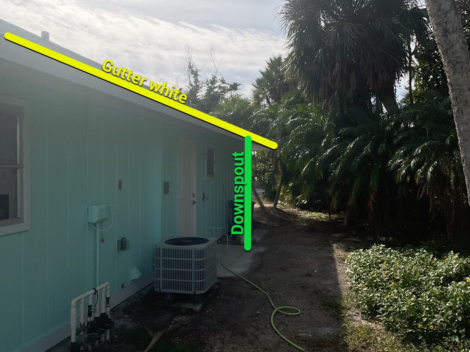 White Seamless Gutters Installation in Sanibel FL by Gutter Professors