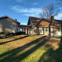 Siding Installation using Perfection Red Western Cedar Shingles  by Loyalty Exterior Solutions 