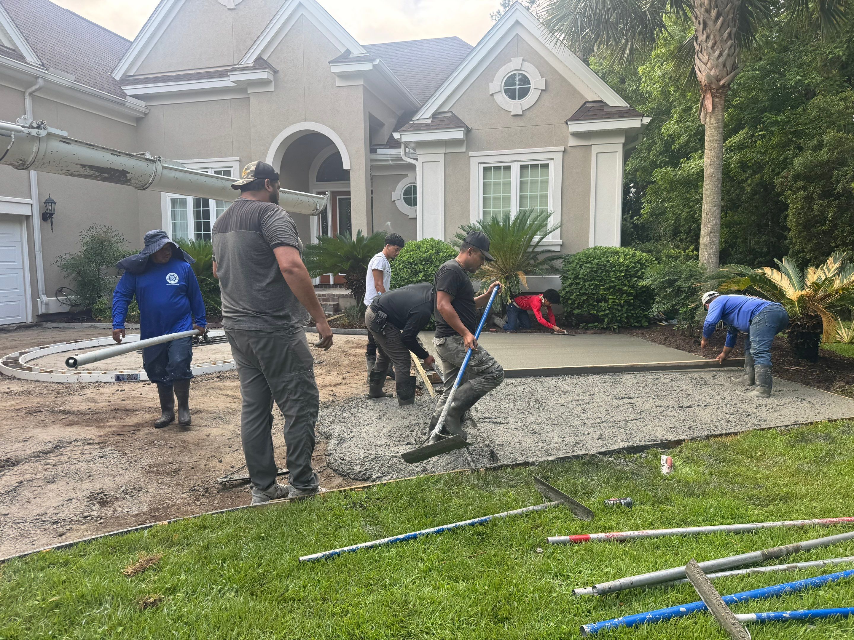 Custom Concrete Driveway and Decorative Paver Installation in Bluffton by Lowcountry Scapes, LLC