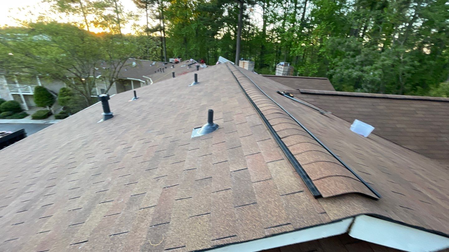 Commercial Roofing Installation using Owens Corning Autumn Brown by Inspector Roofing and Restoration