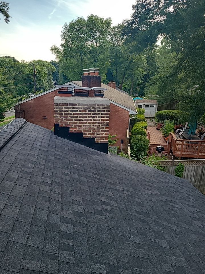 Springfield Tree Damage Restoration: CertainTeed Landmark Designer Shingles in Charcoal Black by RM Banning, Inc.