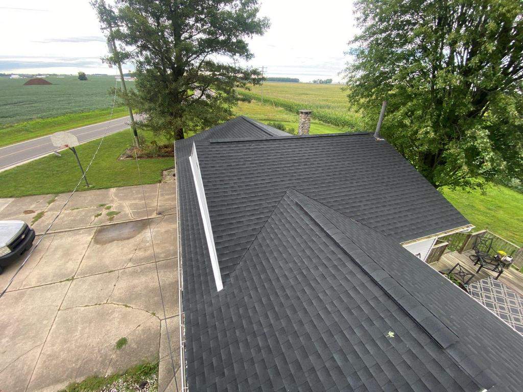 Storm damage roof replacement by Nitro Roofing and Construction